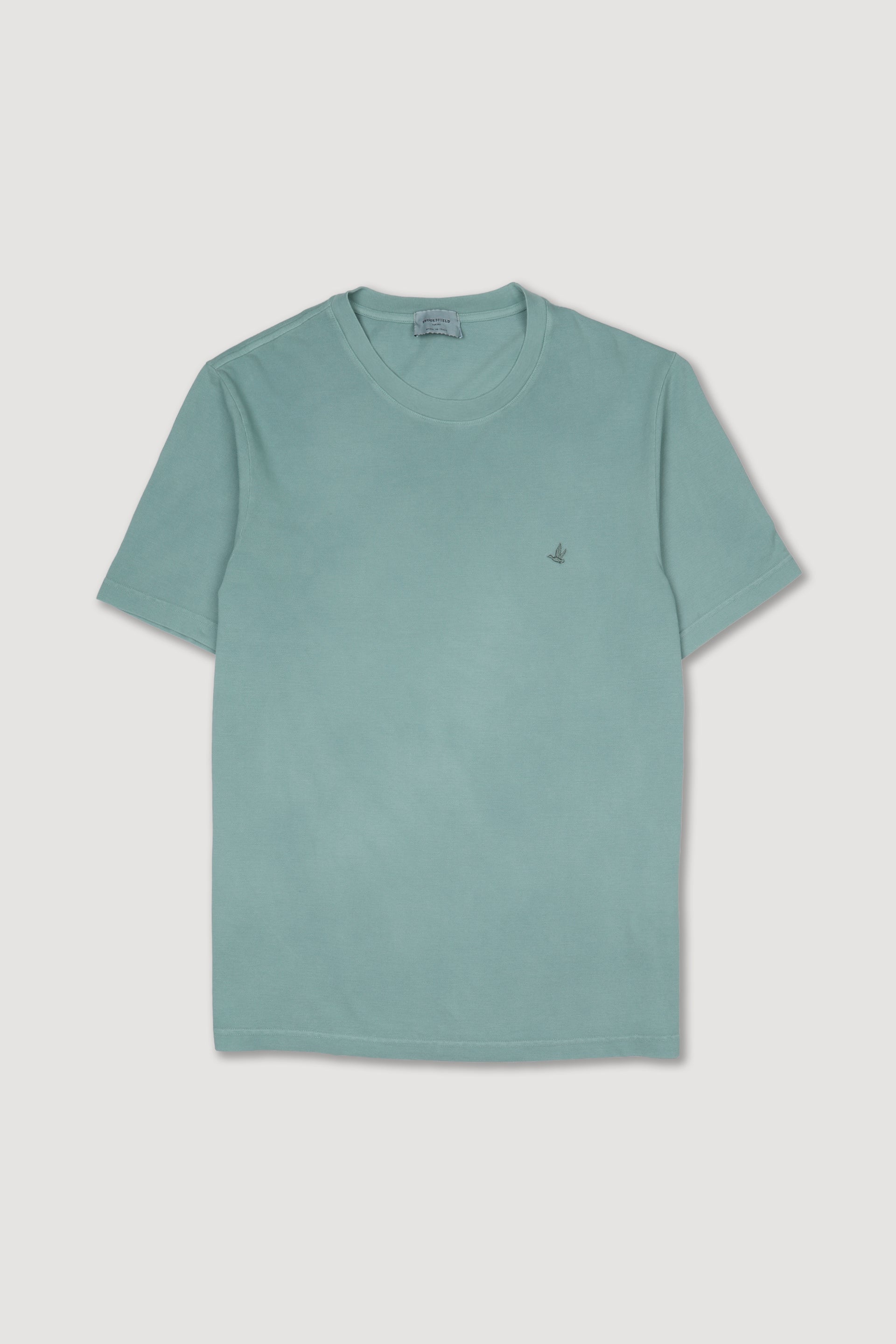 T-shirt in piquet di cotone con tintura effetto old, ricamo logo al cuore. Verde - Peacock
