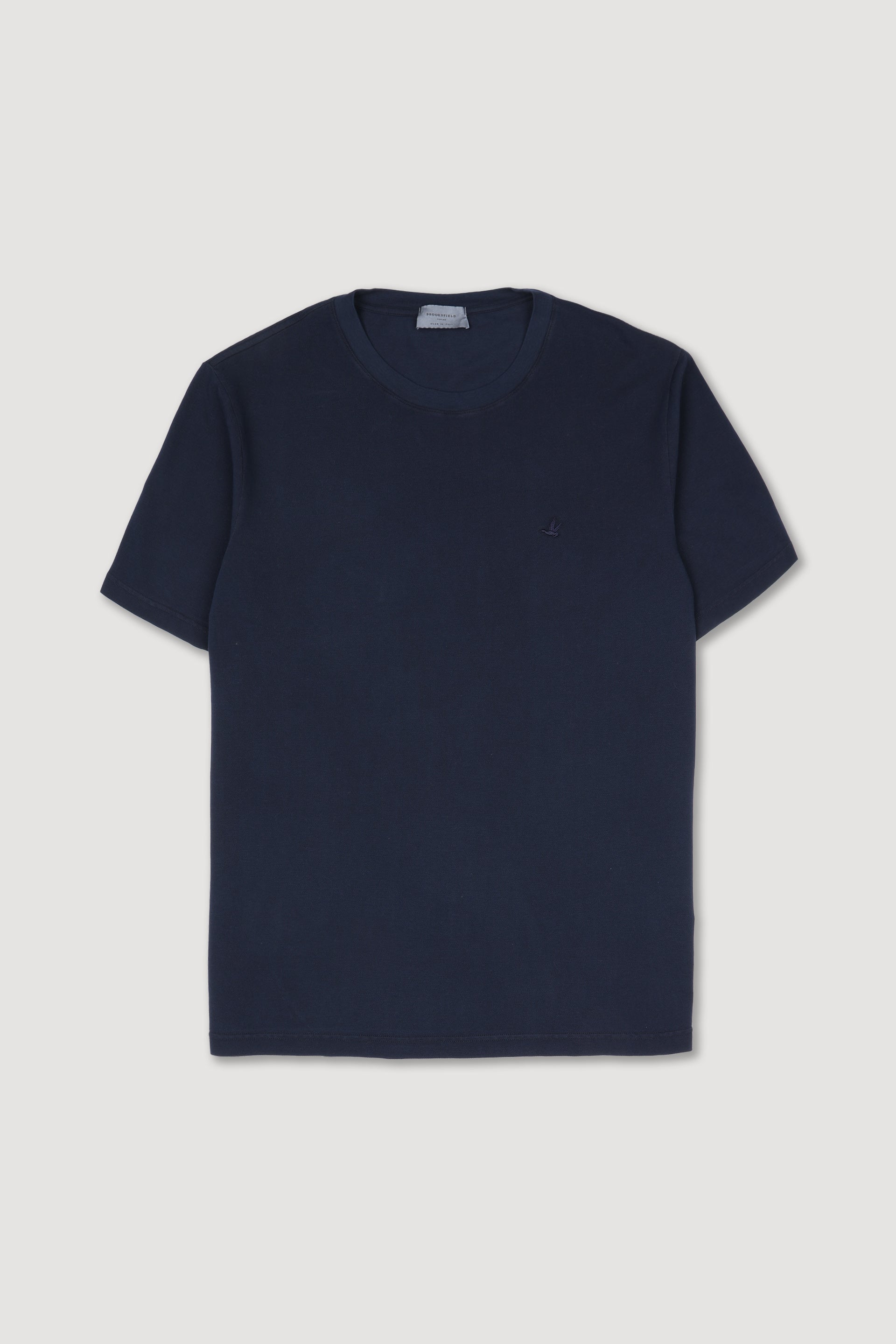 T-shirt in piquet di cotone con tintura effetto old, ricamo logo al cuore. Blu - Navy