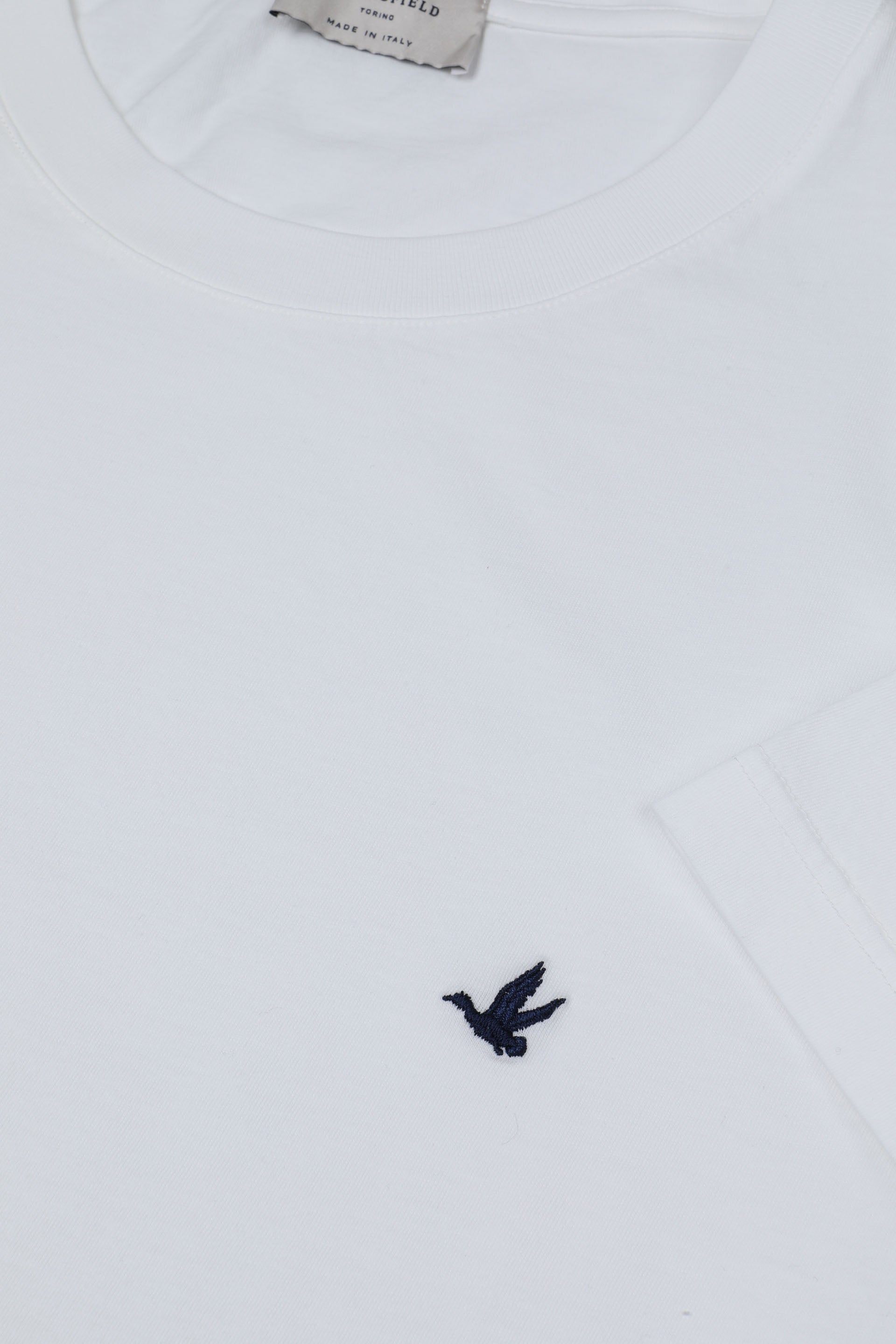 T-shirt in jersey di cotone, logo ricamato al cuore. - Off white