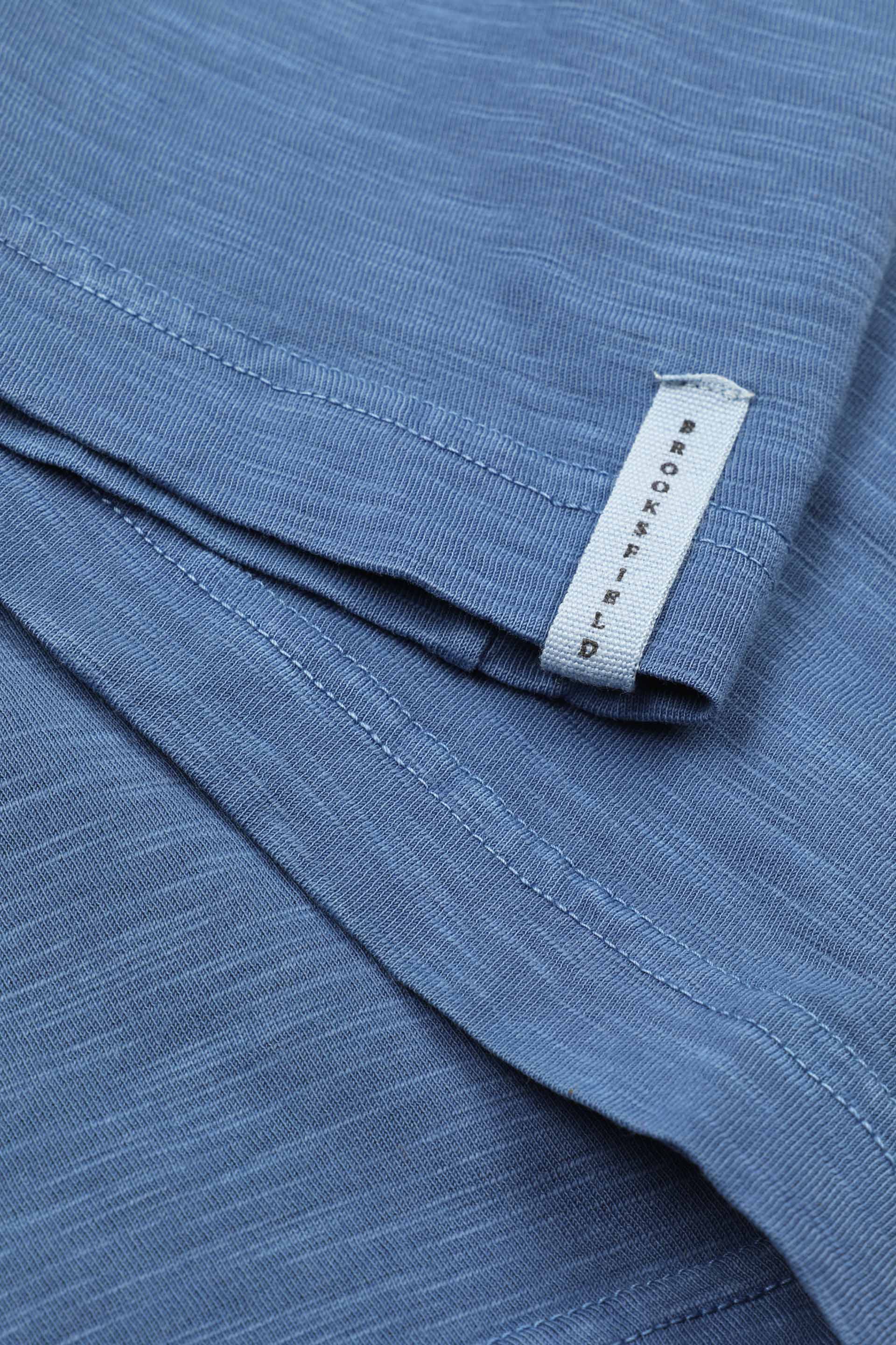 T-shirt in jersey di cotone fiammato con taschino. Blu - Acquario