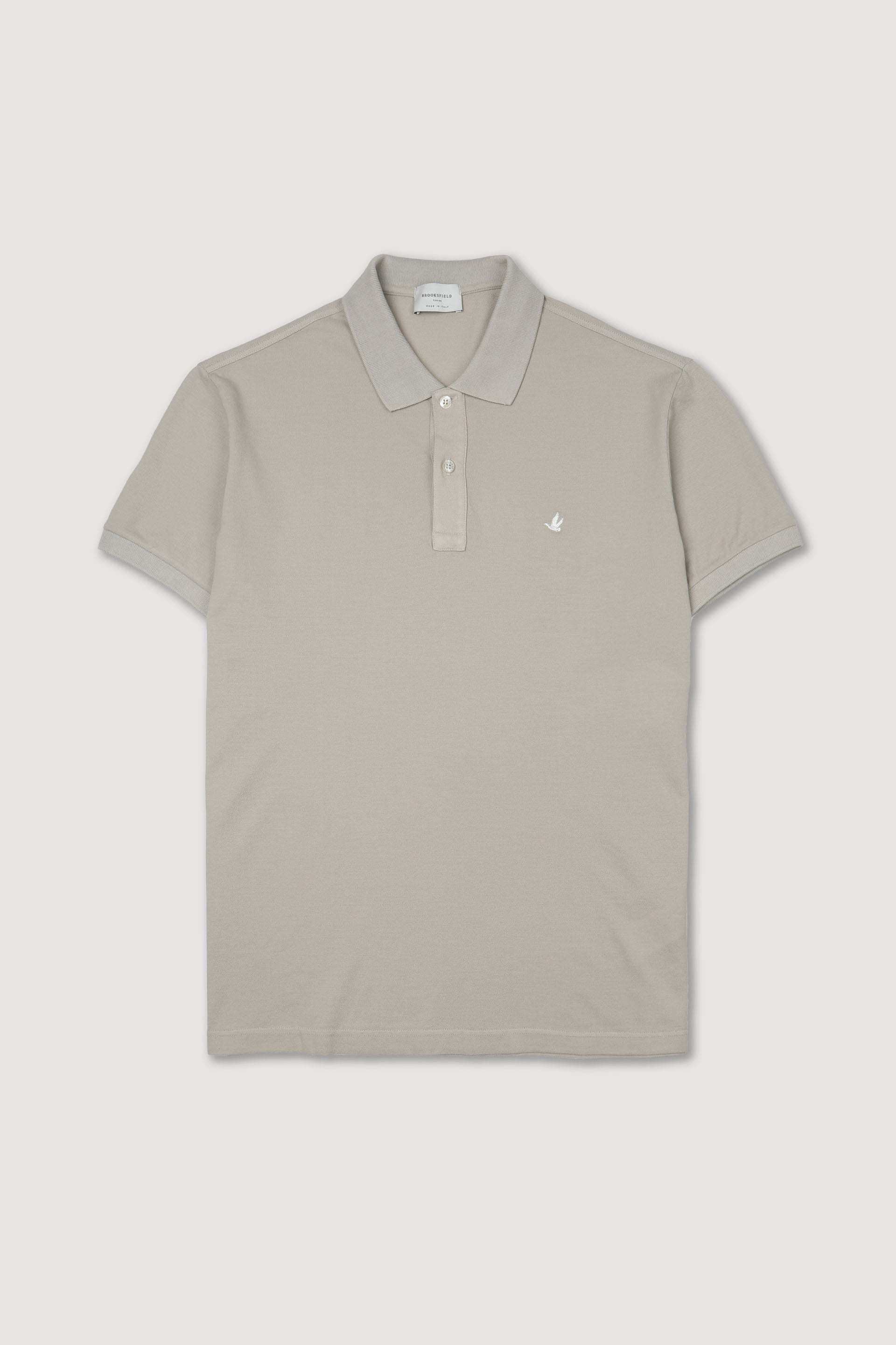 Polo in piquet di cotone con logo ricamato al cuore. Beige - Soft kaki