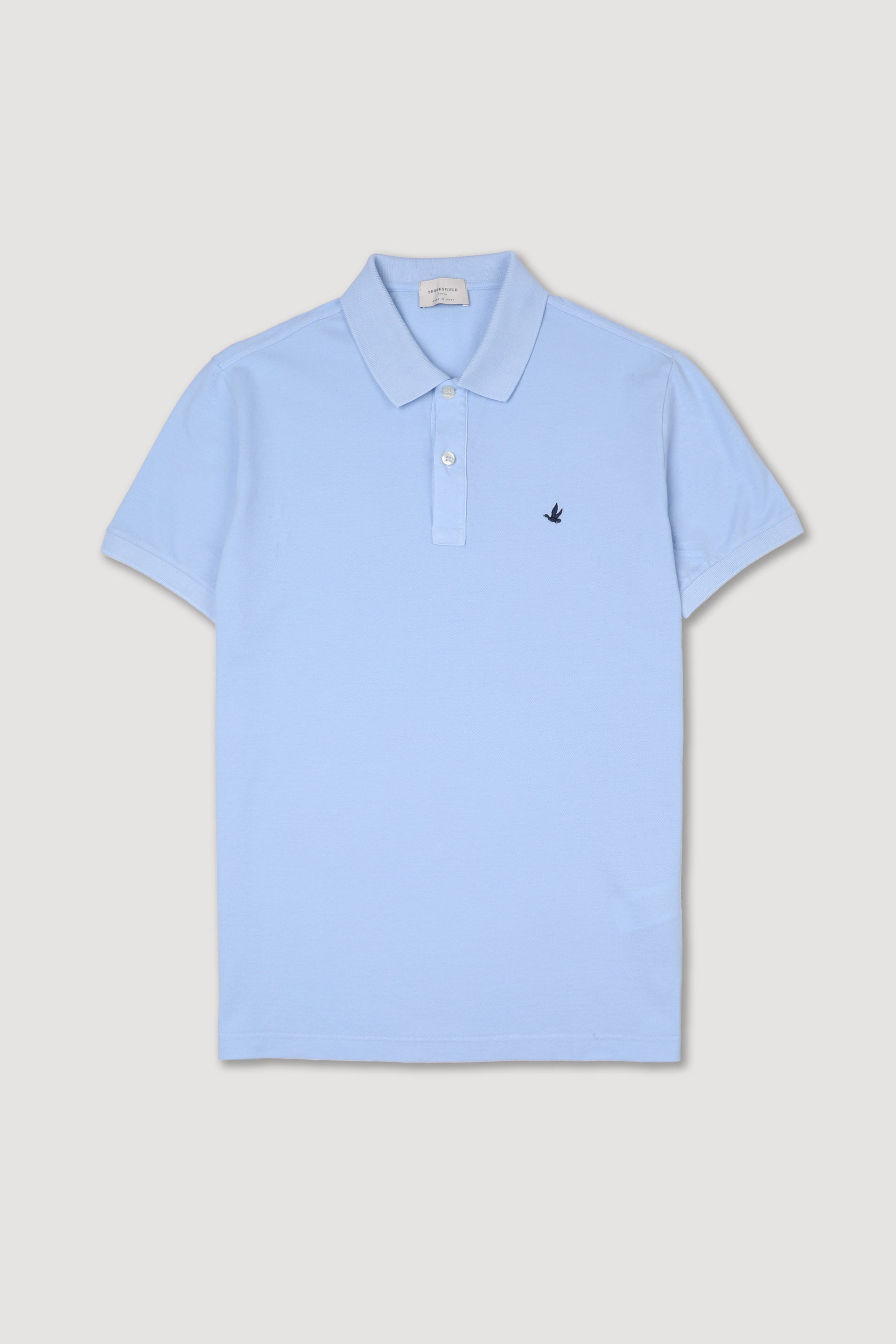 Polo in piquet di cotone con logo ricamato al cuore. Azzurro - Iris