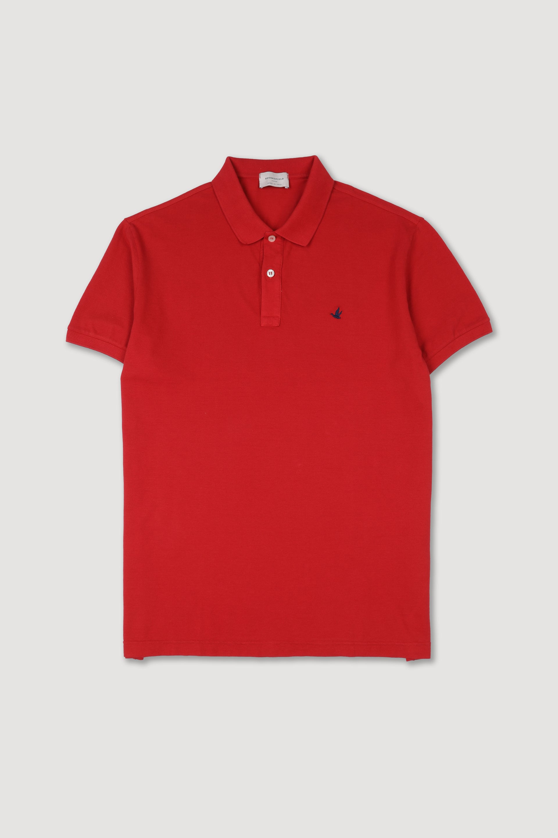 Polo in piquet di cotone con logo ricamato al cuore. Rosso - Ciliegia