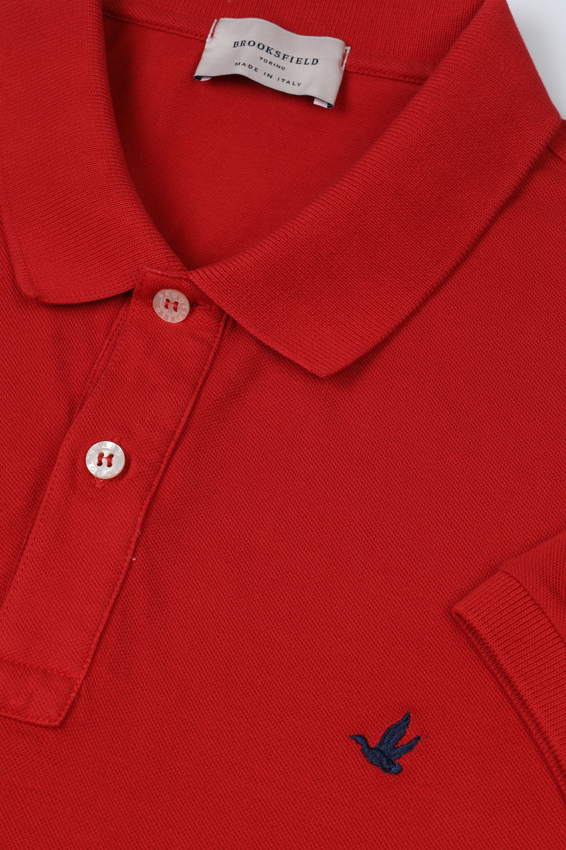 Polo in piquet di cotone con logo ricamato al cuore. Rosso - Ciliegia