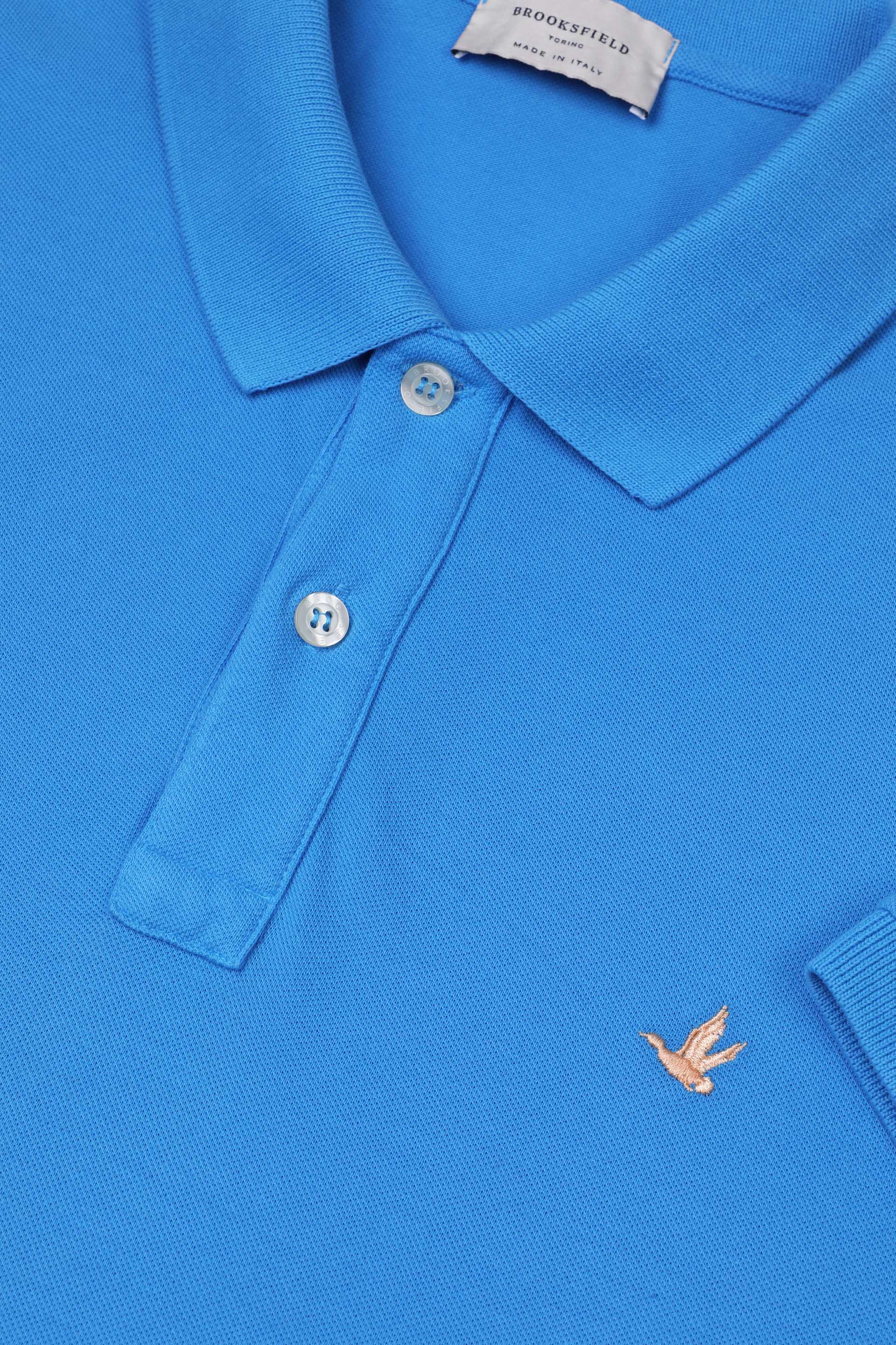 Polo in piquet di cotone con logo ricamato al cuore. Azzurro - Ultramarine