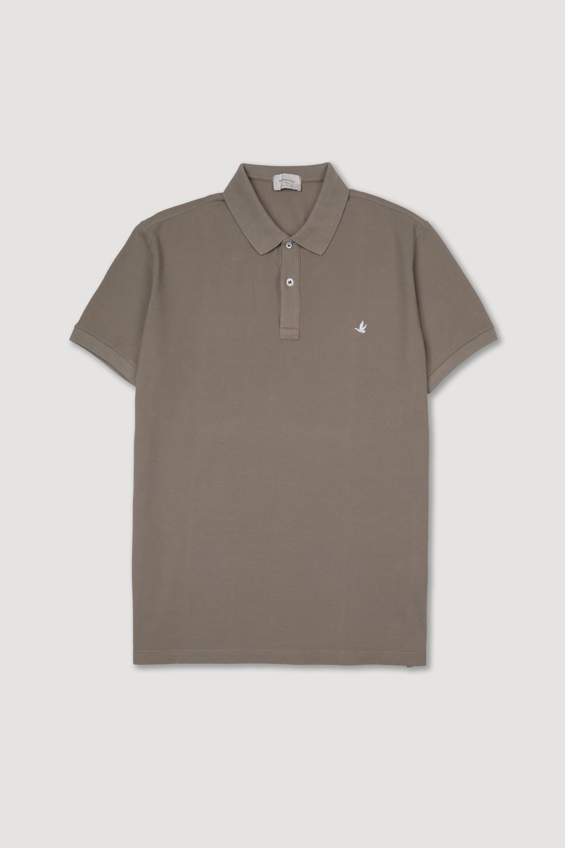 Polo in piquet di cotone con logo ricamato al cuore. Beige - Coloniale