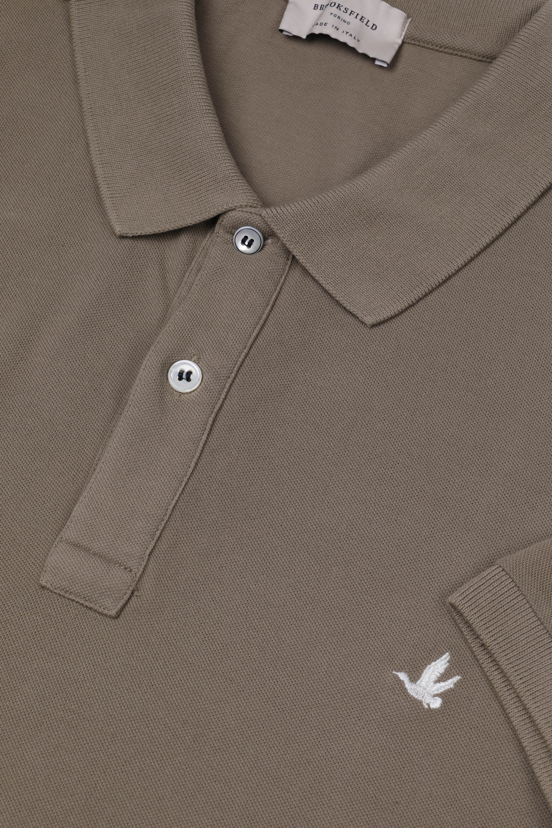 Polo in piquet di cotone con logo ricamato al cuore. Beige - Coloniale