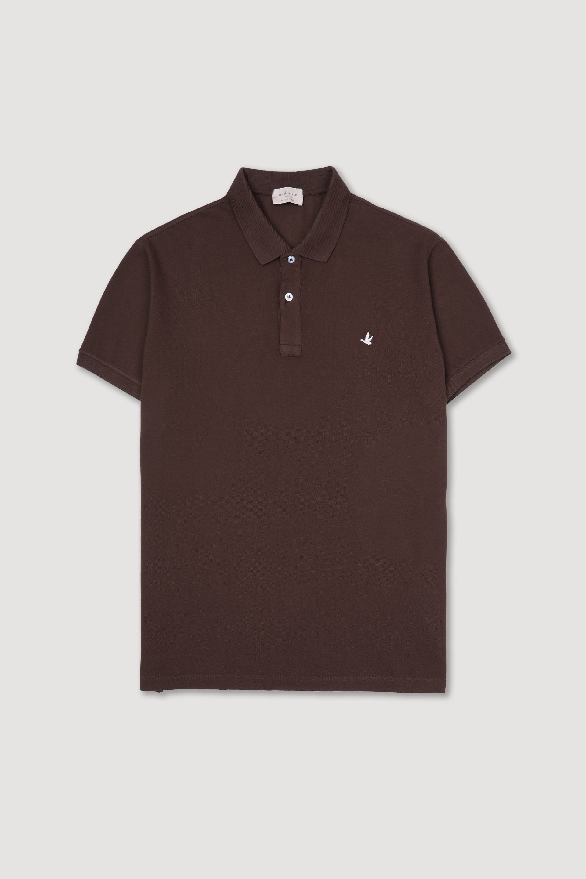 Polo in piquet di cotone con logo ricamato al cuore. Marrone - Coconut