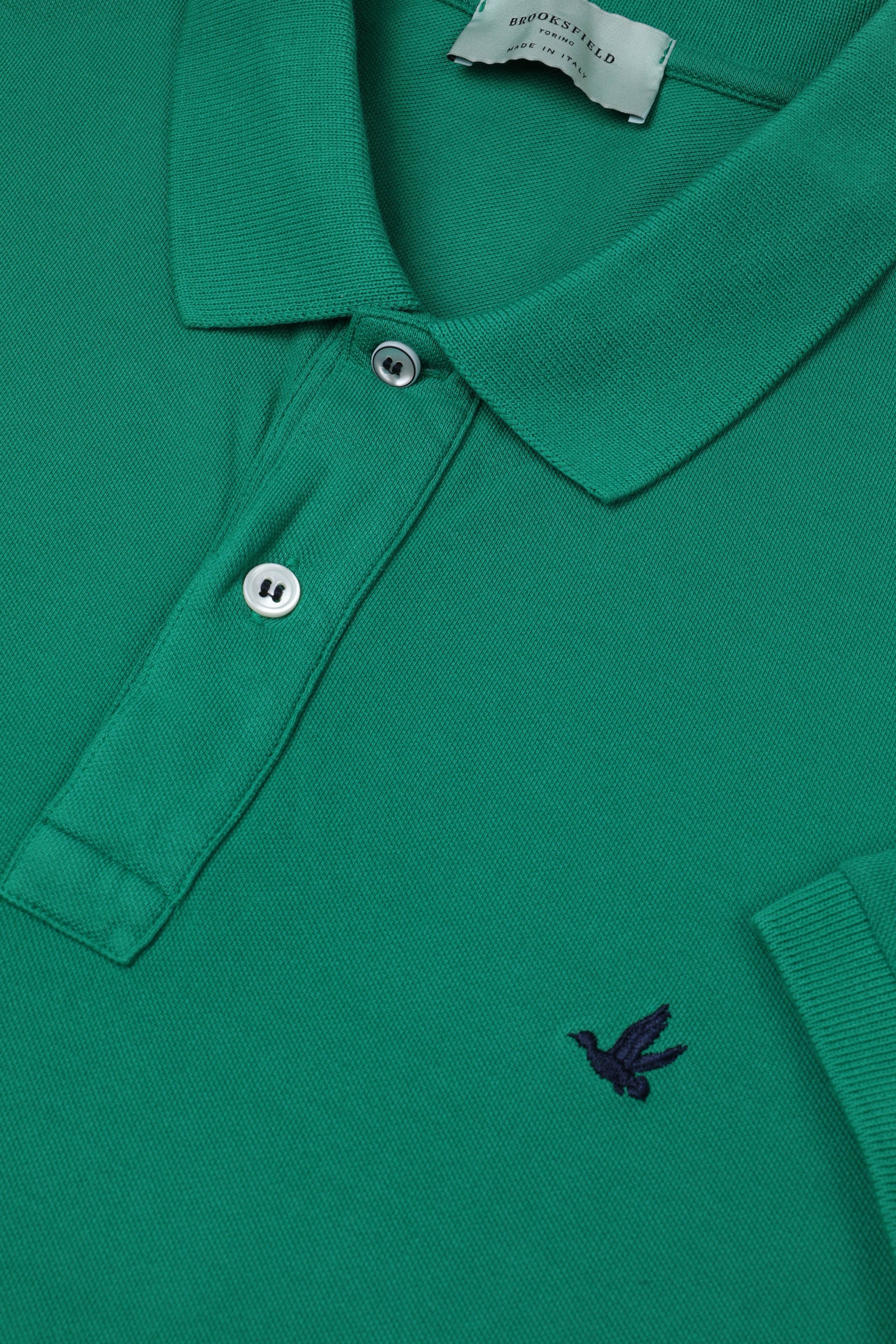 Polo in piquet di cotone con logo ricamato al cuore. Verde - Flag green