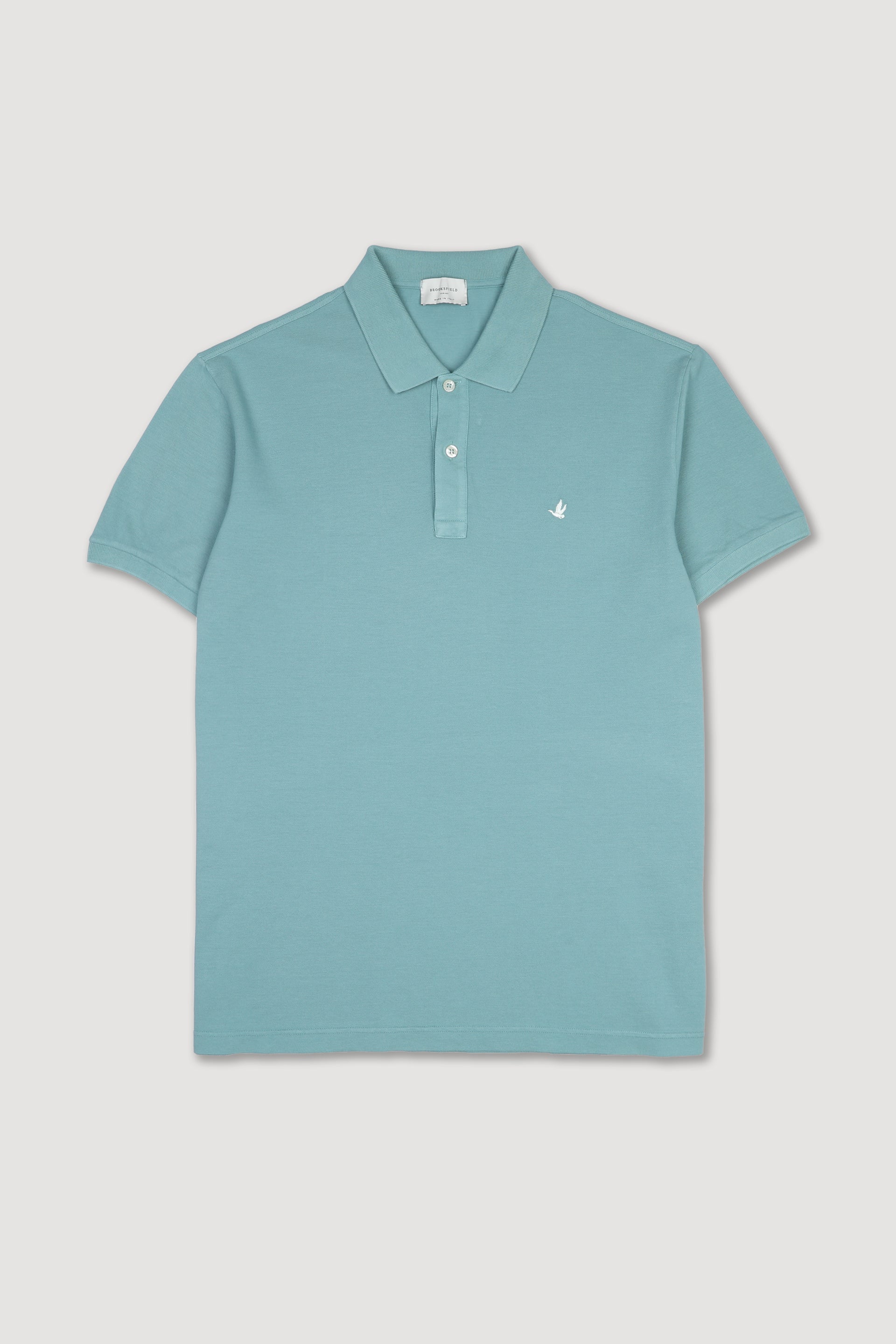 Polo in piquet di cotone con logo ricamato al cuore. Verde - Peacock