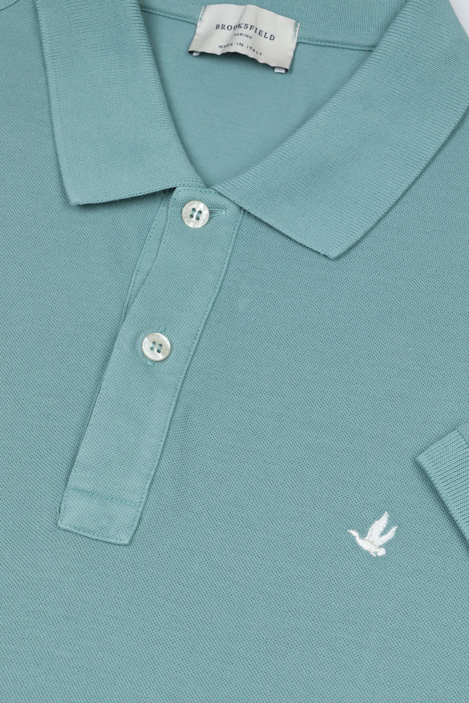 Polo in piquet di cotone con logo ricamato al cuore. Verde - Peacock