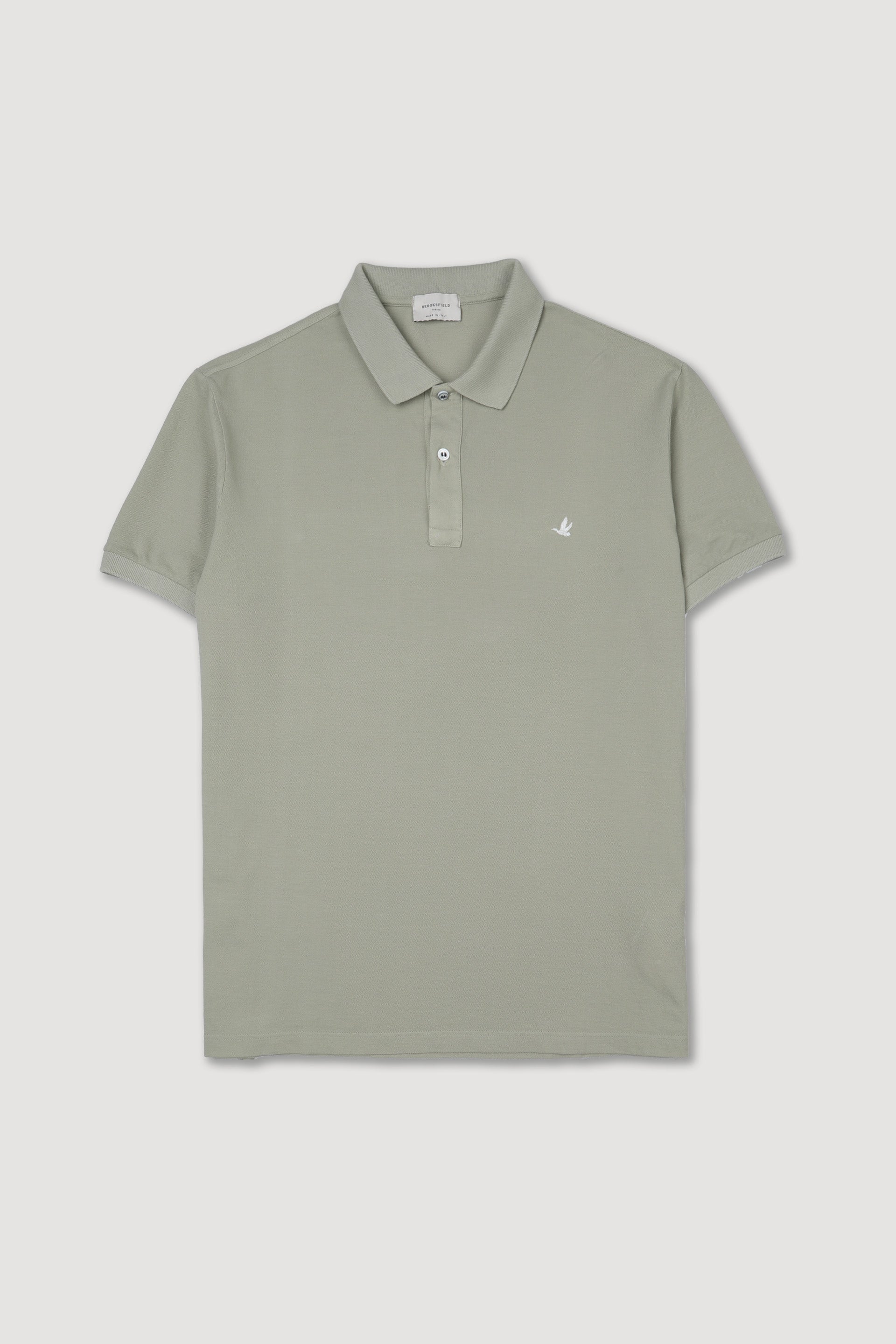 Polo in piquet di cotone con logo ricamato al cuore. Verde - Artichoke
