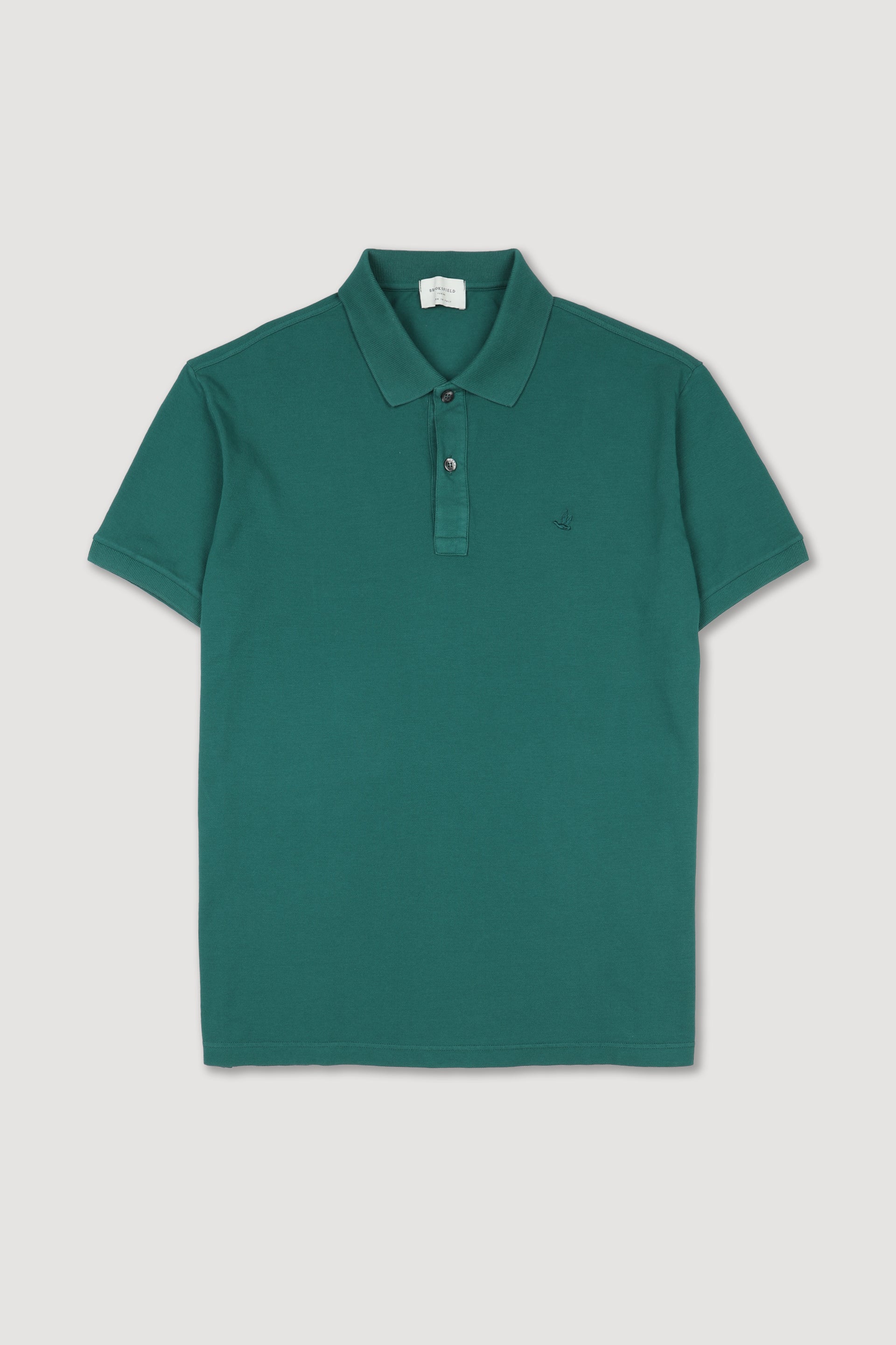 Polo in piquet di cotone con logo ricamato al cuore. Verde - Greenie
