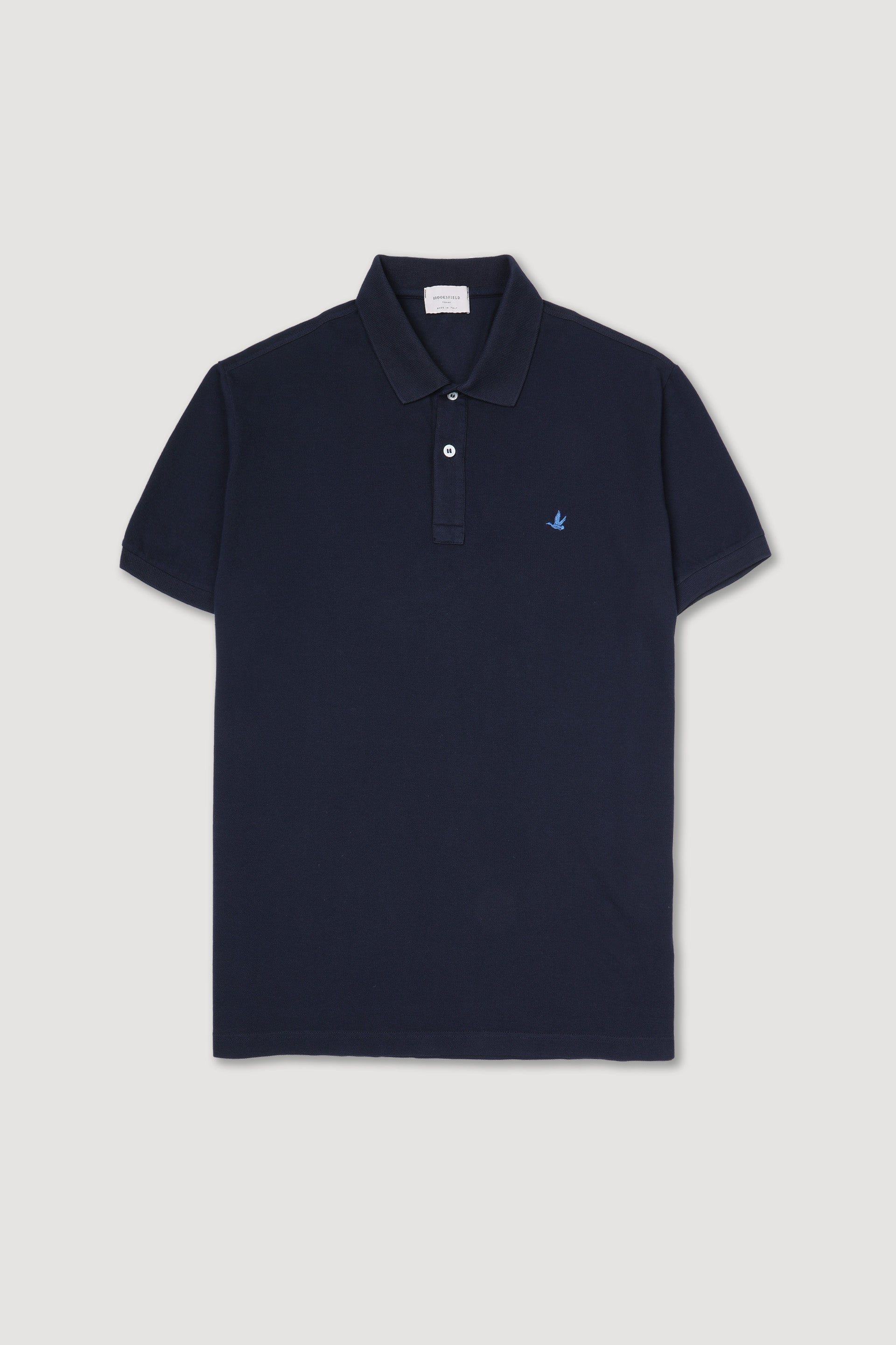 Polo in piquet di cotone con logo ricamato al cuore. Blu - Navy