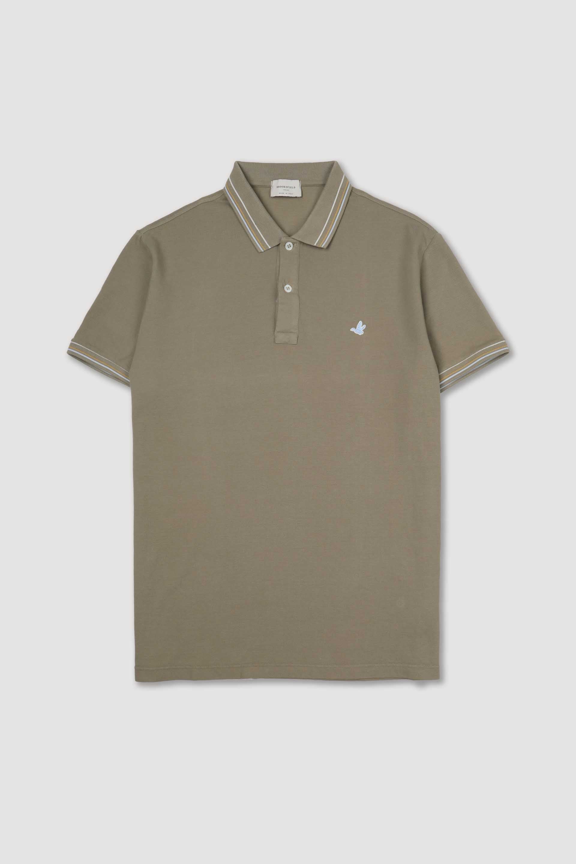 Polo in piquet di cotone con collo e polsi rigati. Logo ricamato al cuore. Beige - Coloniale