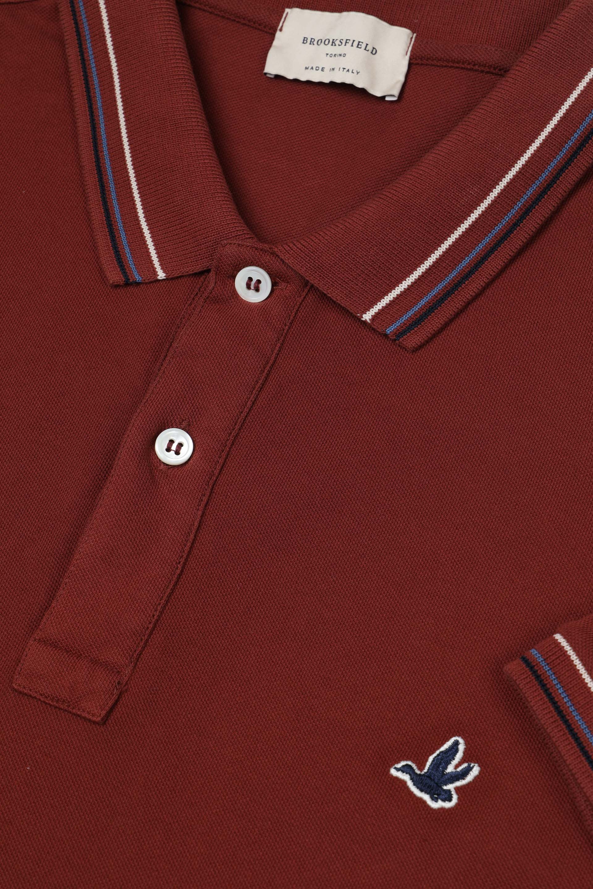 Polo in piquet di cotone con collo e polsi rigati. Logo ricamato al cuore. Rosso - Tabasco
