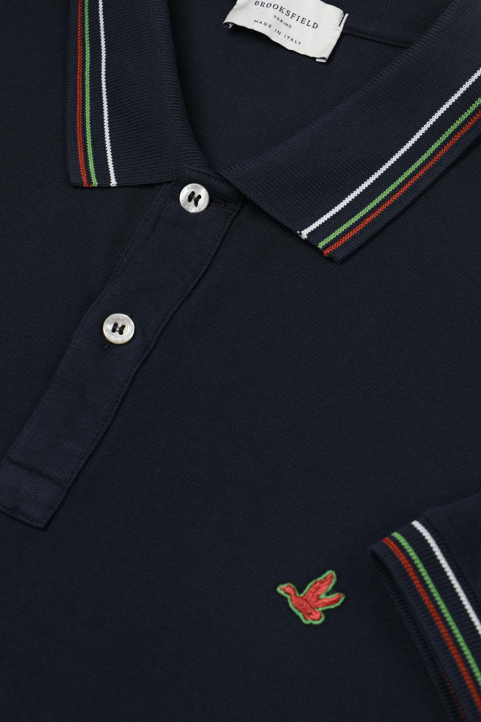 Polo in piquet di cotone con collo e polsi rigati. Logo ricamato al cuore - Navy