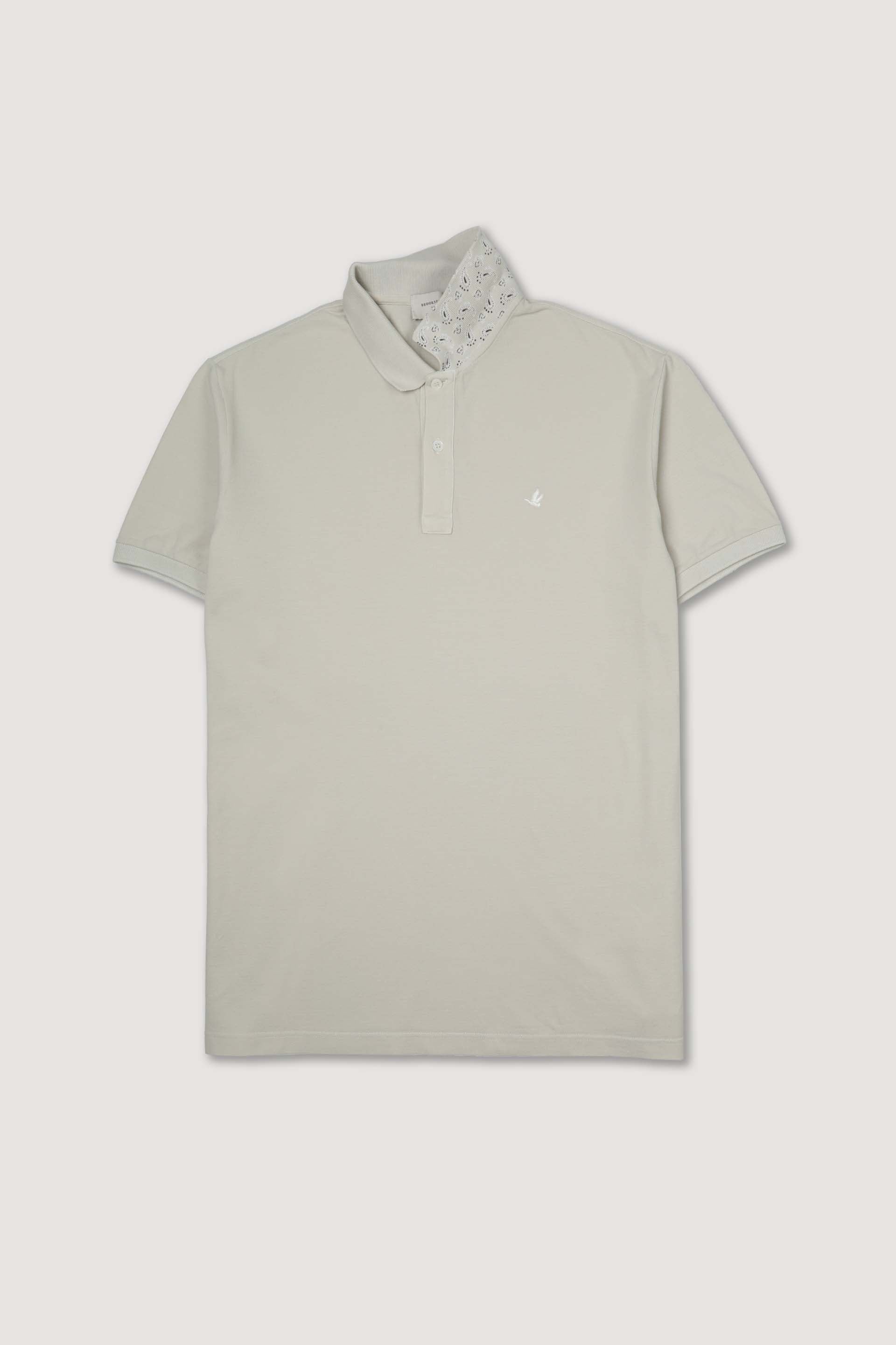 Polo in piquet di cotone, sottocollo stampato. Logo ricamato al cuore. Beige - Canvas