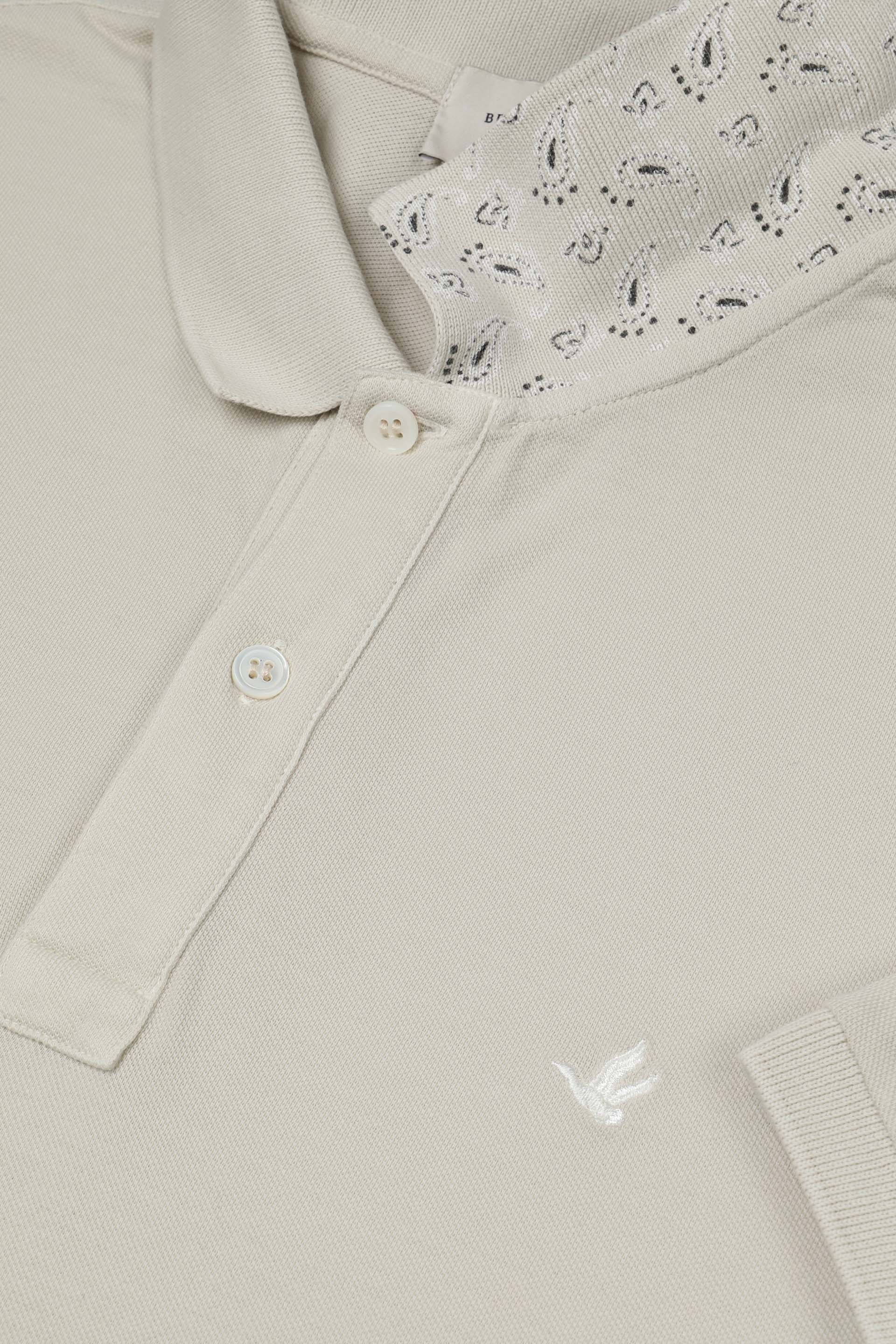 Polo in piquet di cotone, sottocollo stampato. Logo ricamato al cuore. Beige - Canvas