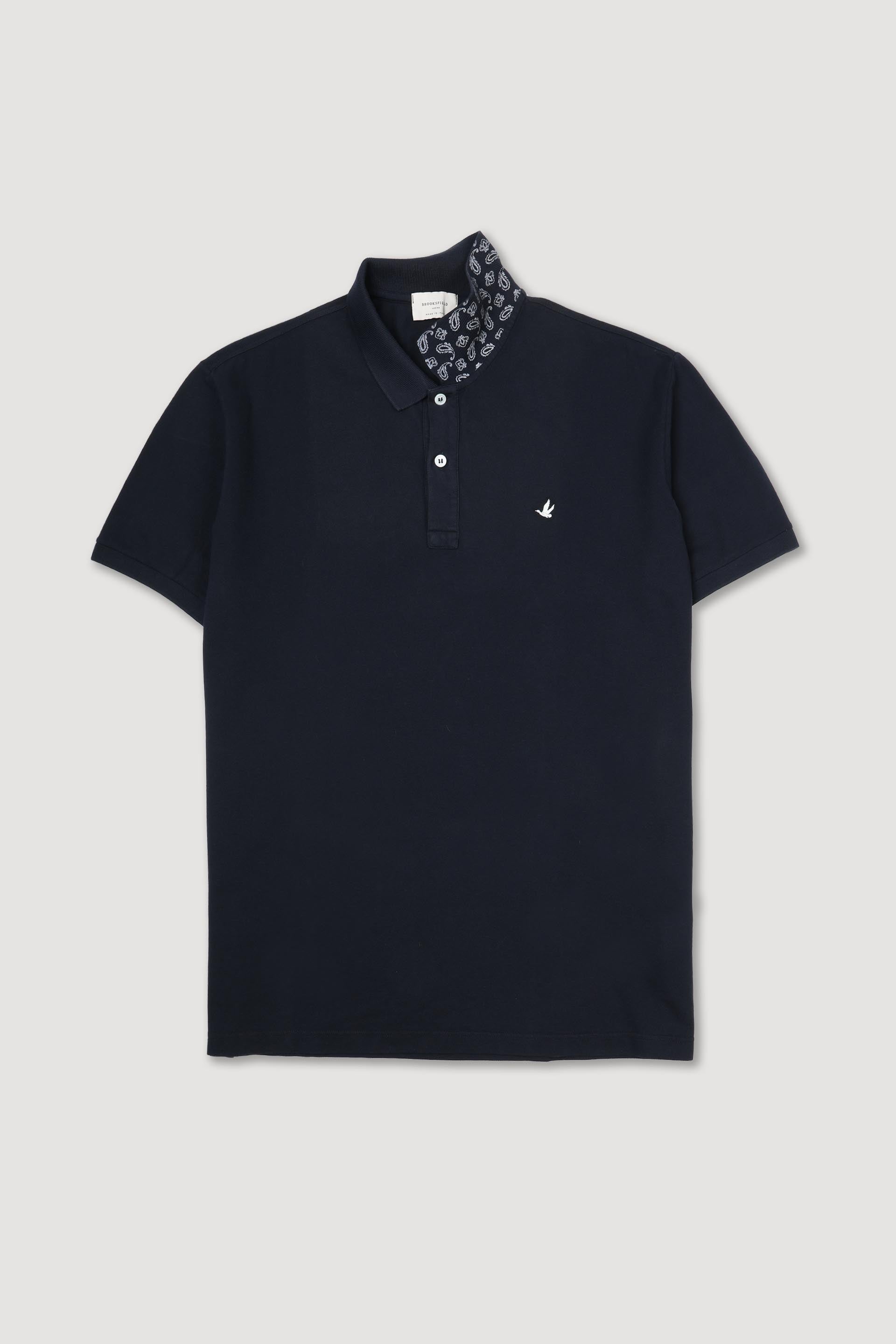 Polo in piquet di cotone, sottocollo stampato. Logo ricamato al cuore. Blu - Navy