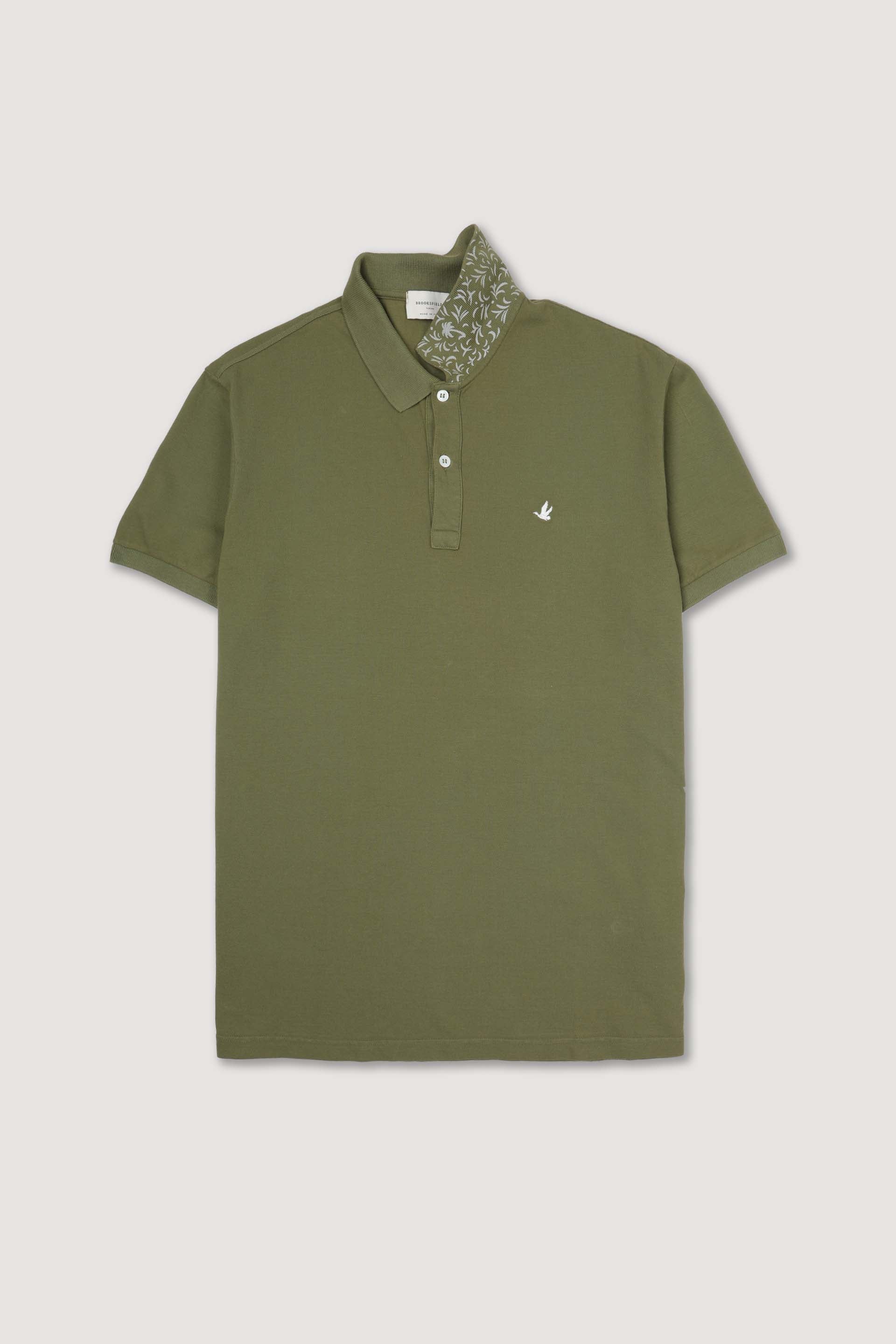Polo in piquet di cotone, sottocollo stampato. Logo ricamato al cuore. Verde - Cipresso