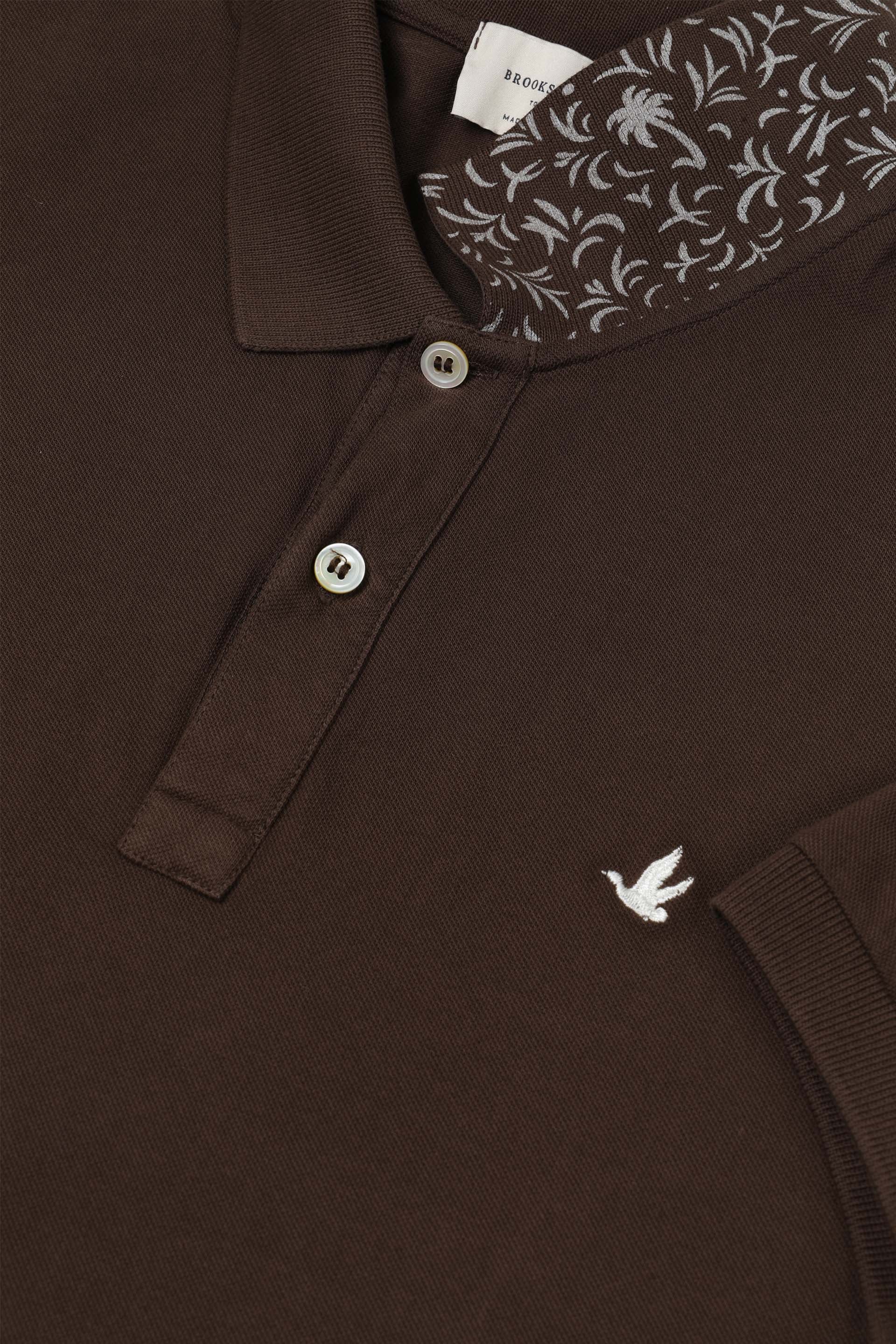 Polo in piquet di cotone, sottocollo stampato. Logo ricamato al cuore. Marrone - Coconut