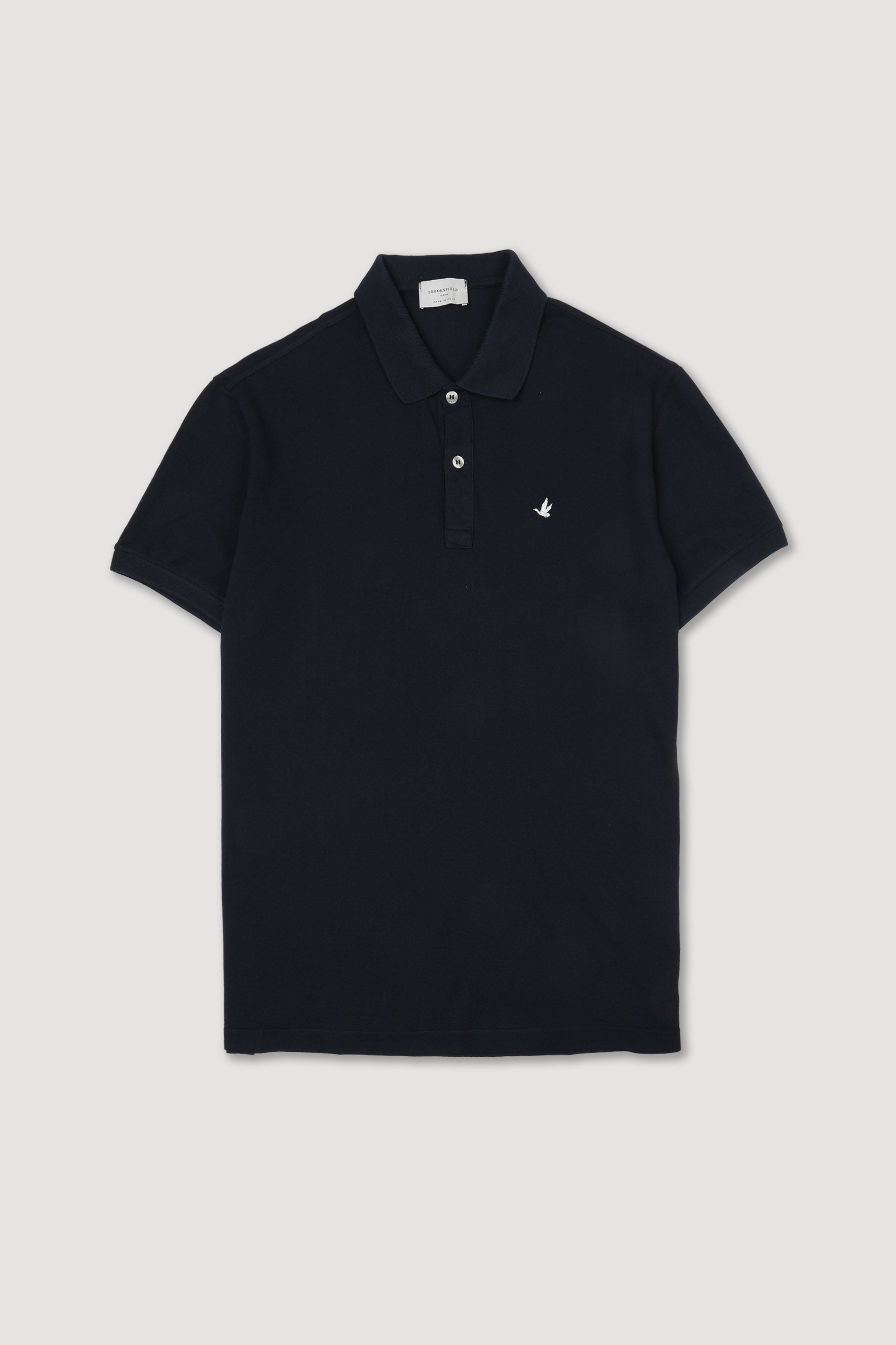 Polo in piquet di cotone, sottocollo stampato. Logo ricamato al cuore. Verde - Navy