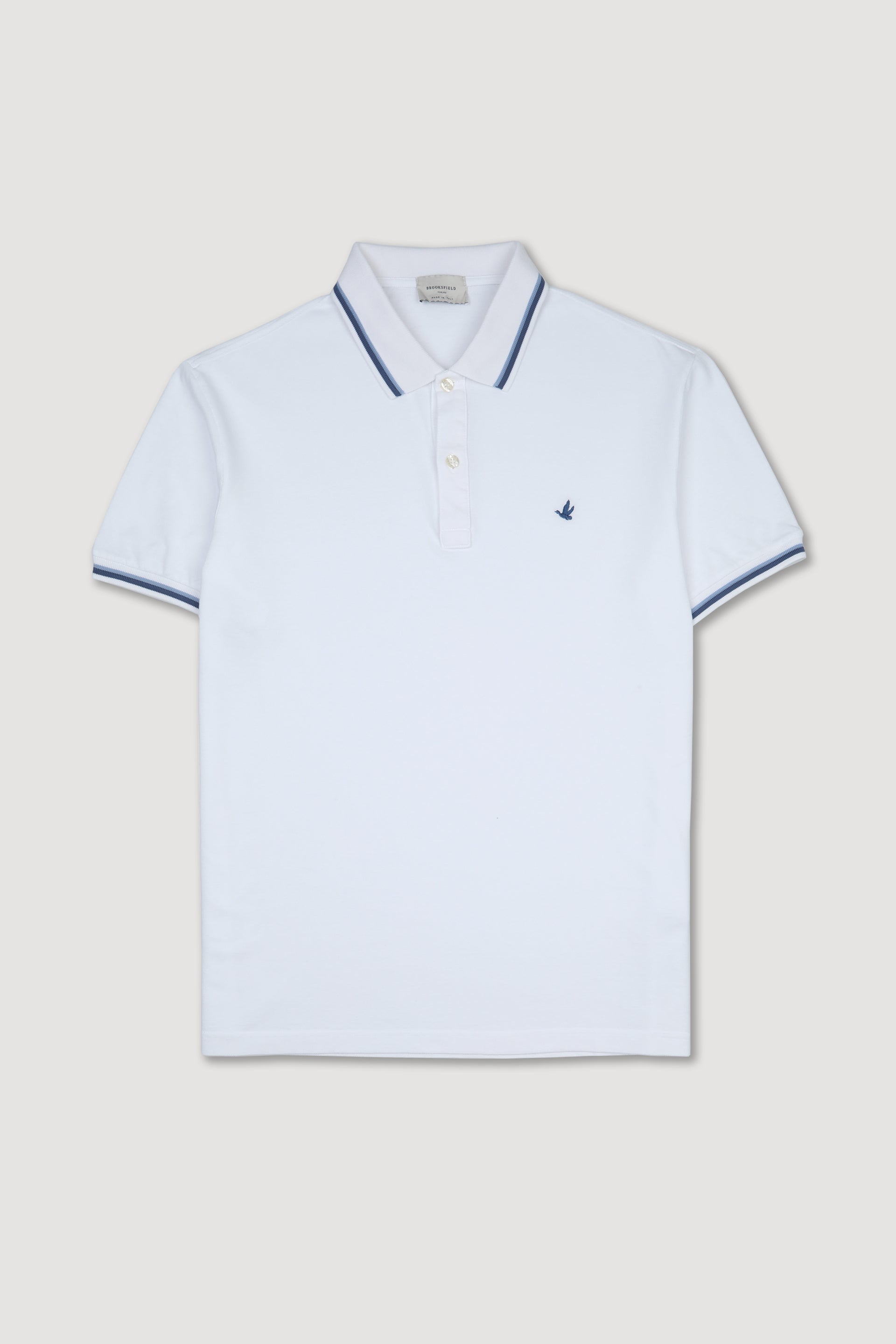 Polo in piquet di cotone con collo e polsi rigati. Logo ricamato al cuore. Bianco - White