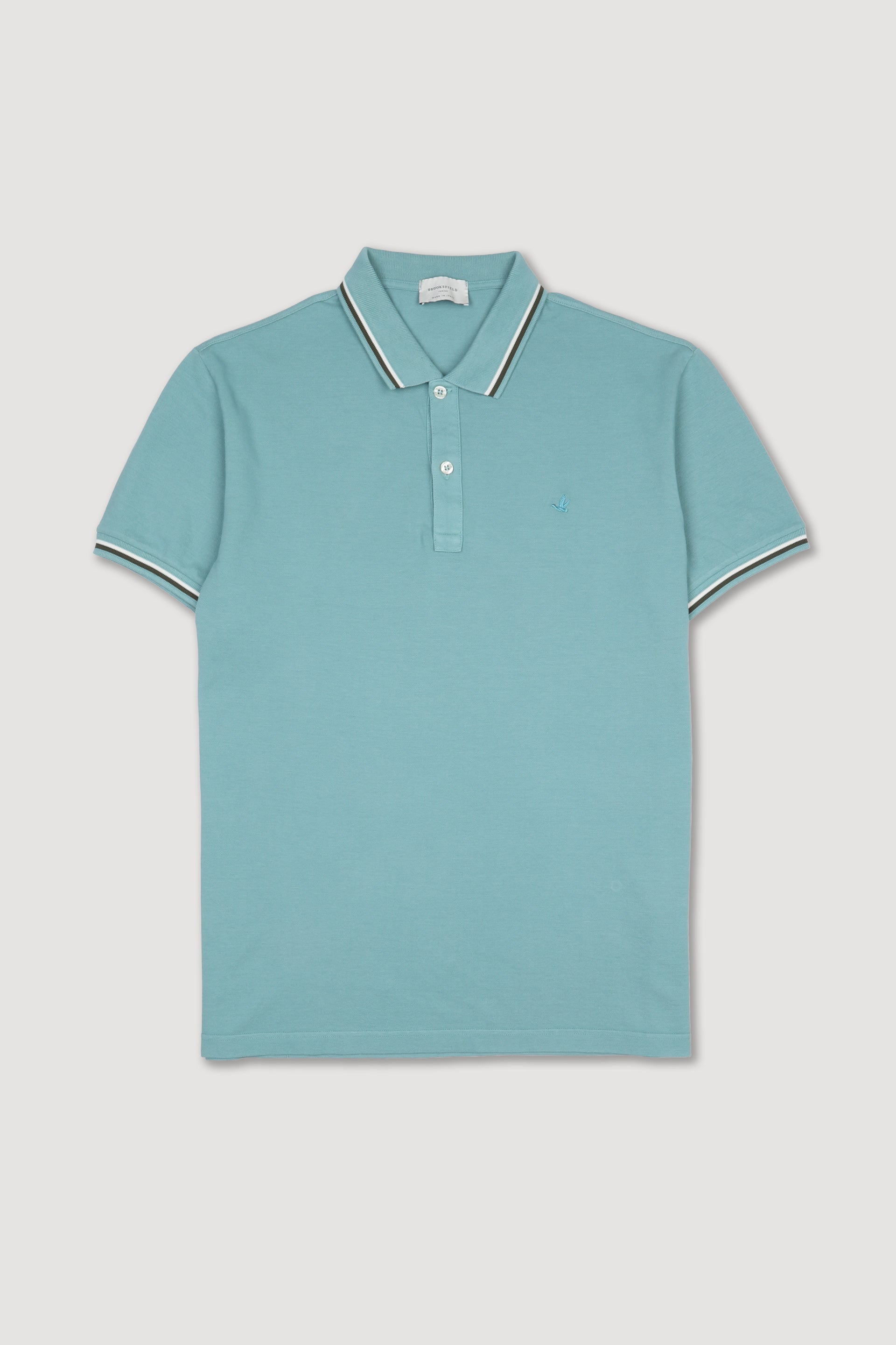 Polo in piquet di cotone con collo e polsi rigati. Logo ricamato al cuore. Verde - Peacock