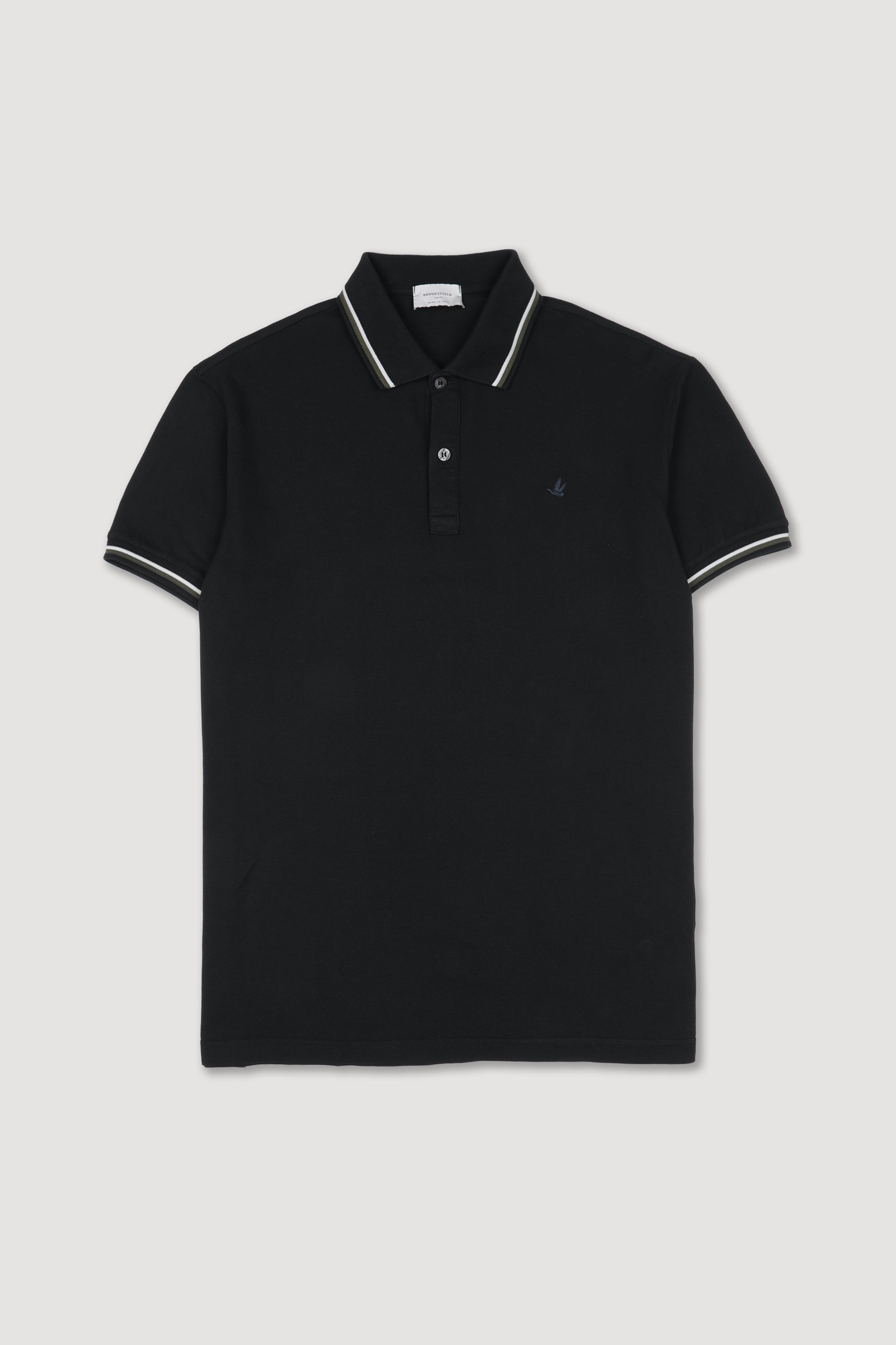 Polo in piquet di cotone con collo e polsi rigati. Logo ricamato al cuore. Nero - Black
