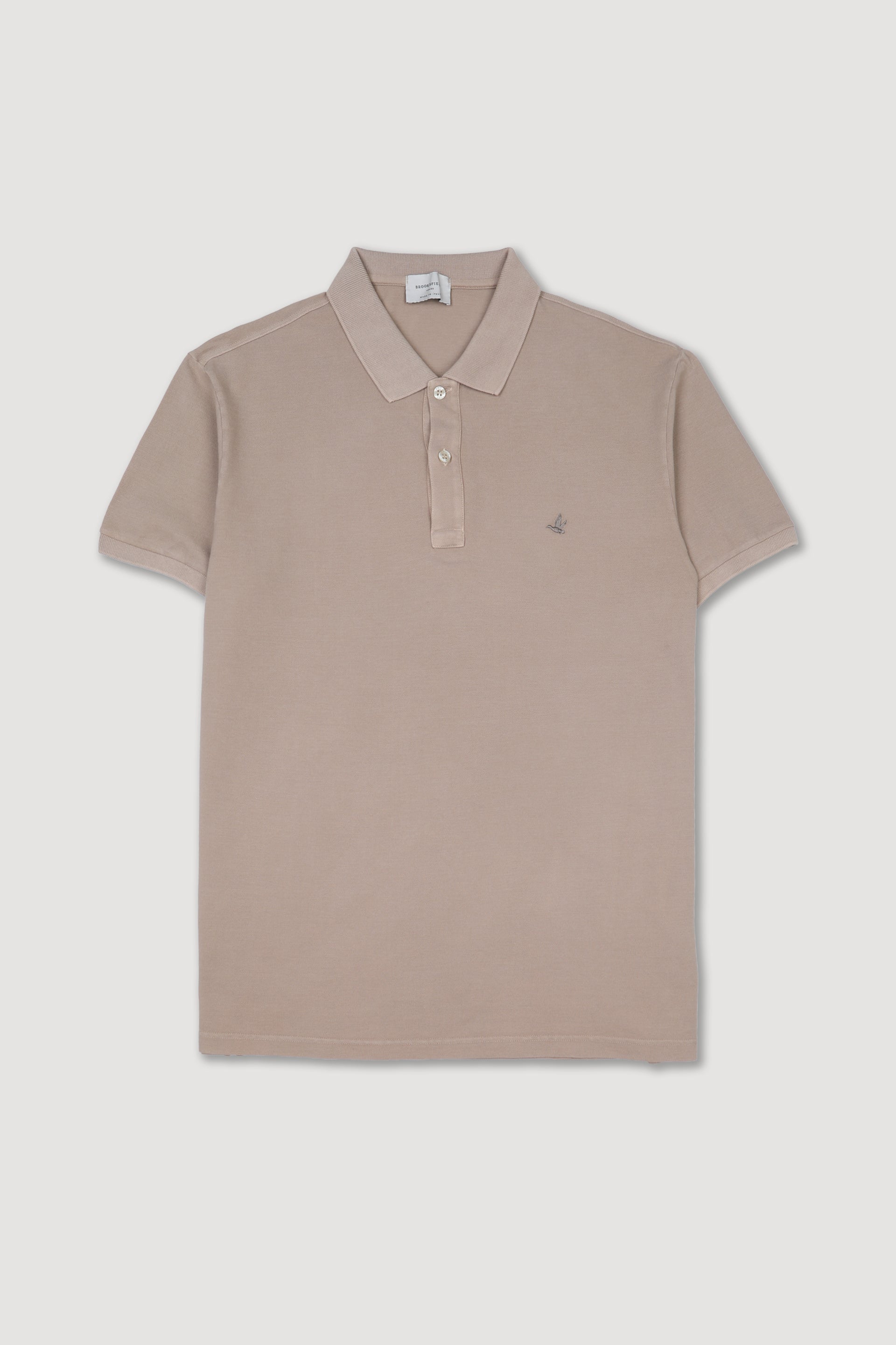 Polo in piquet di cotone, tintura effetto old. Logo ricamato al cuore. Beige - Soft kaki