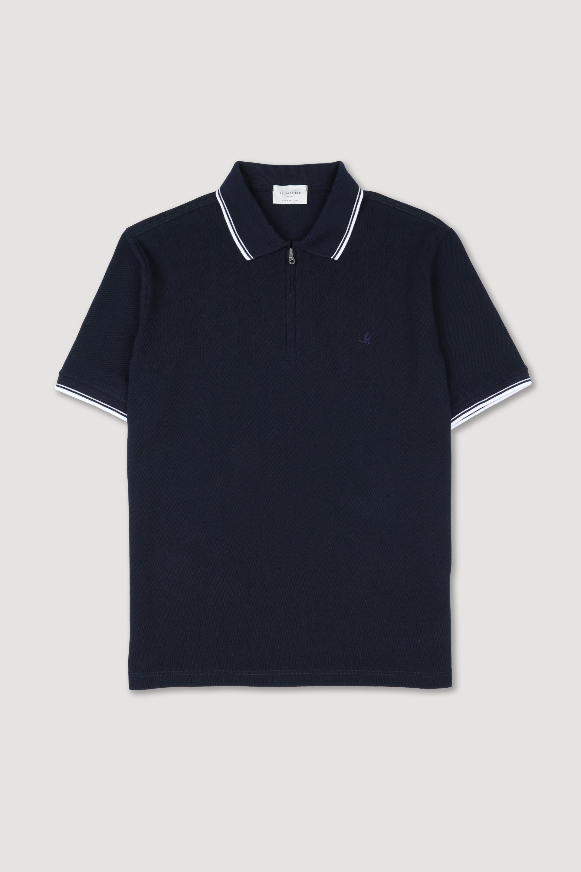 Polo in piquet di cotone con collo e polsi rigati e apertura con zip. Blu - Navy