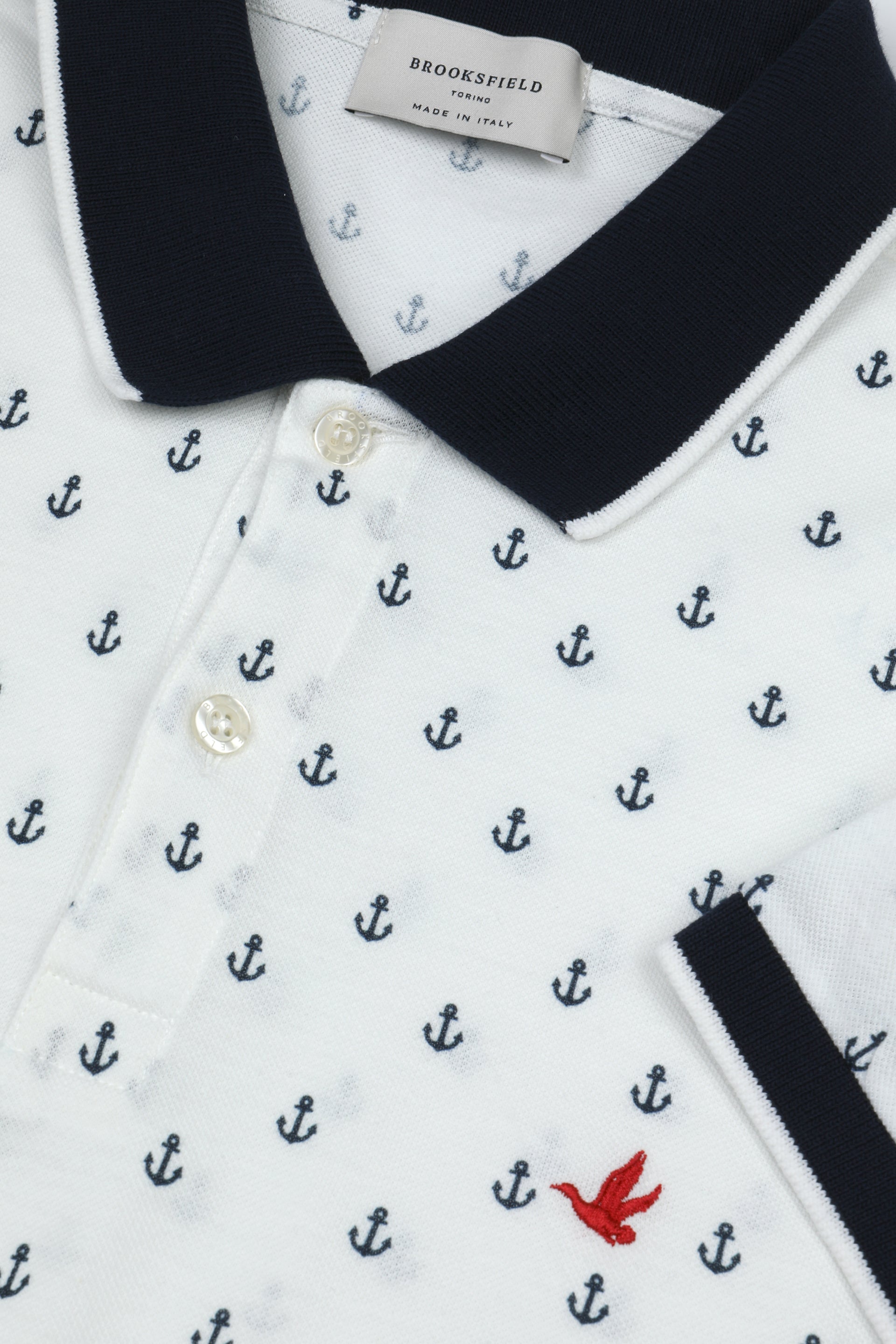 UOMO-POLO M/C PIQUET LIGHT STAMPATO "ANCORETTA" ALL OVER COLLO E POLSI RIGATI, SPACCHI A FESSURA, LAVATA - Bianco