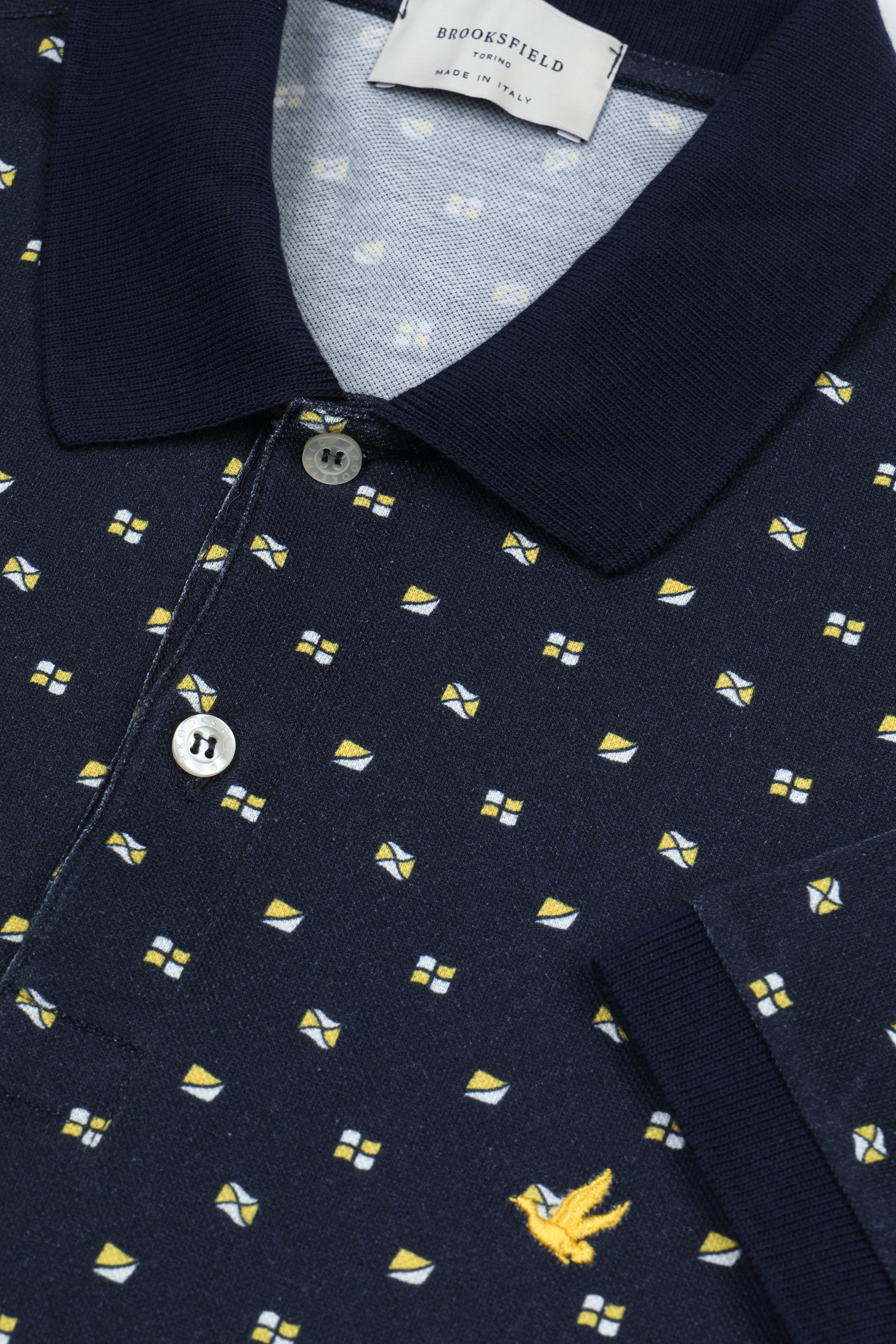 UOMO-POLO M/C PIQUET LIGHT STAMPATO "BANDIERINE" ALL OVER COLLO E POLSI UNITI, SPACCHI A FESSURA, LAVATA - Blu