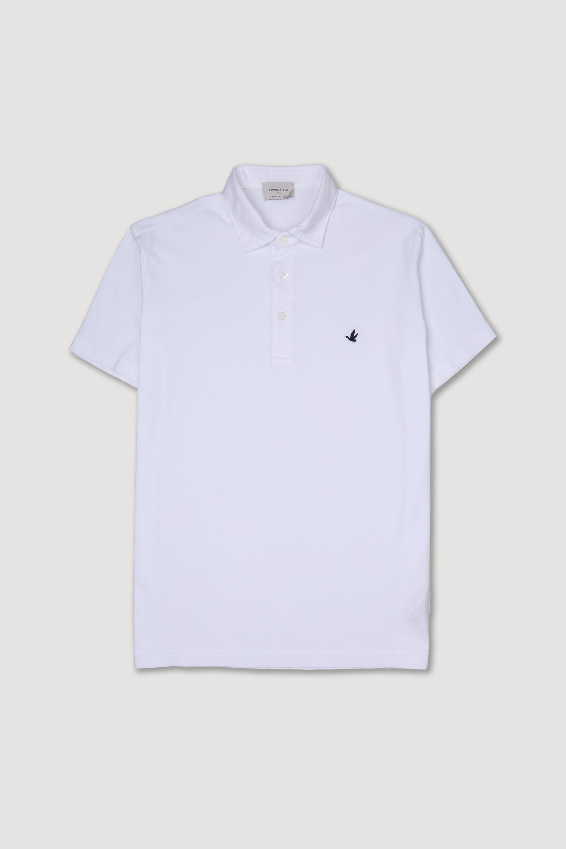 Polo in jersey di cotone con logo ricamato al cuore. Bianco - White
