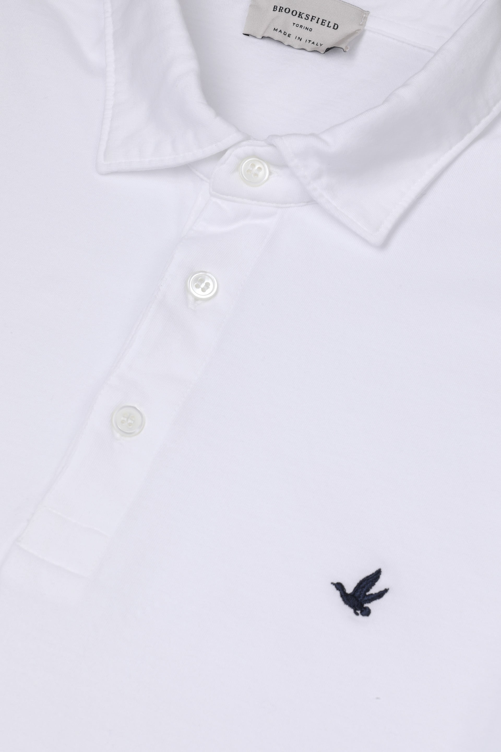 Polo in jersey di cotone con logo ricamato al cuore. Bianco - White