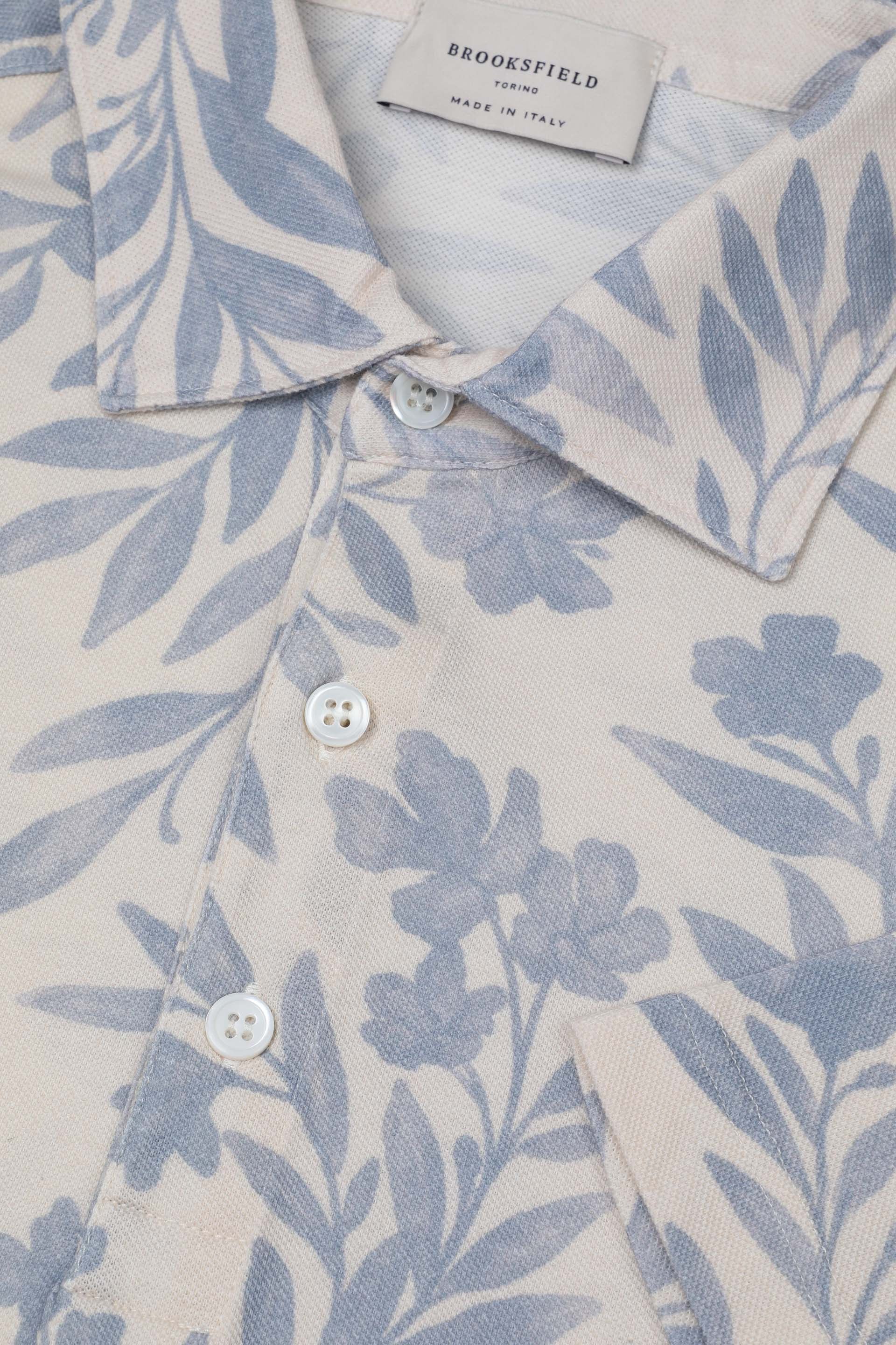 Polo in piquet di cotone, stampa floreale. Azzurro - Milk/Light blue