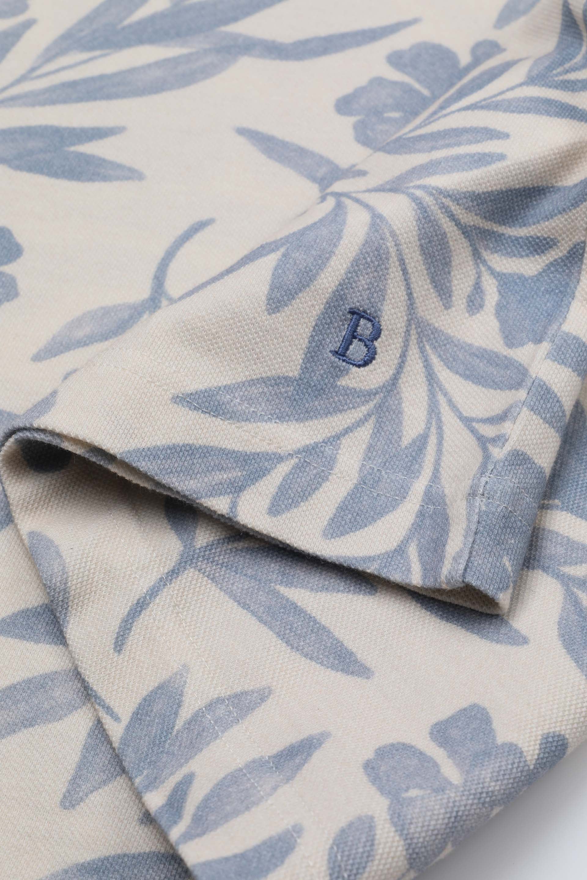 Polo in piquet di cotone, stampa floreale. Azzurro - Milk/Light blue
