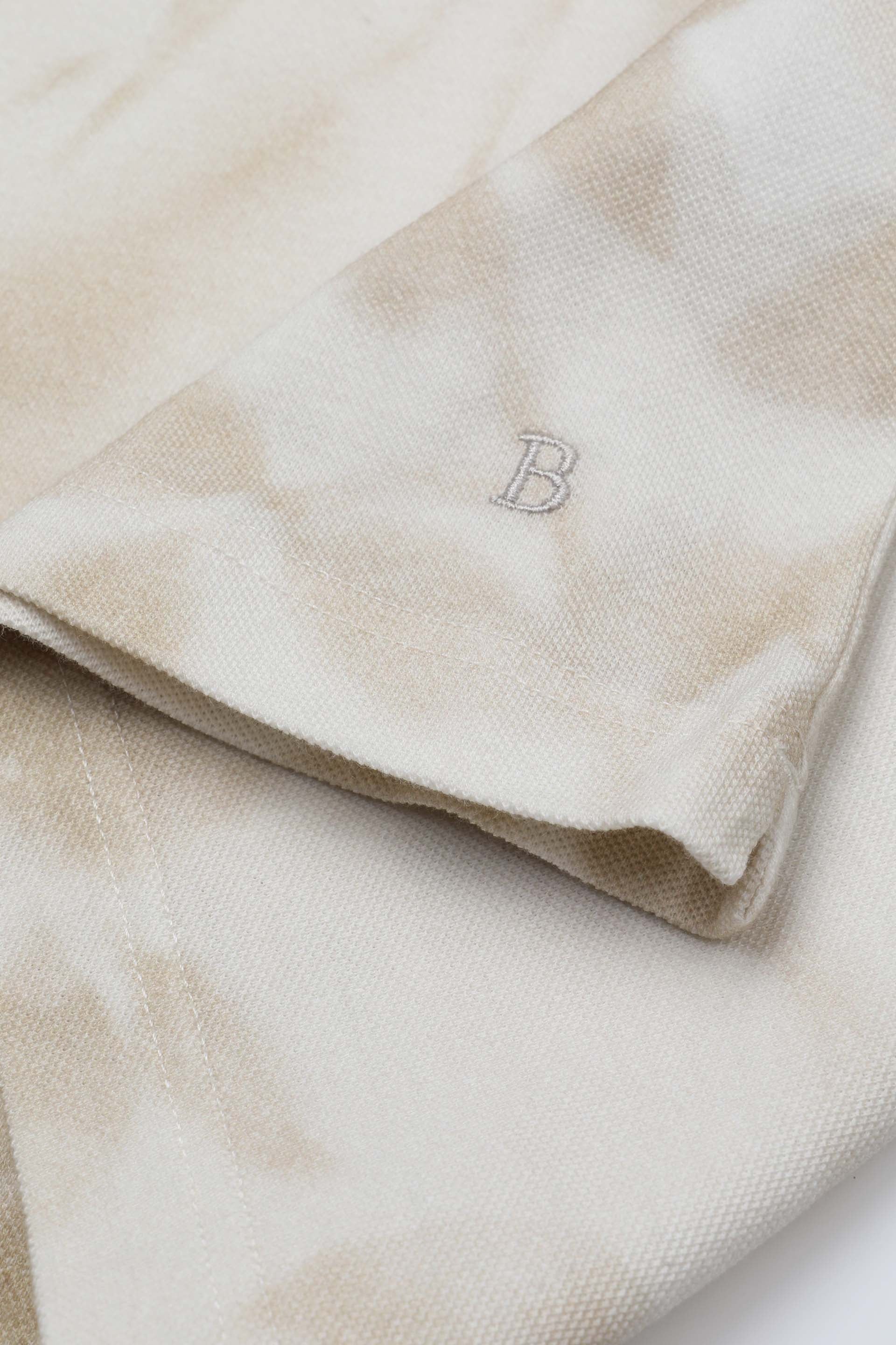 Polo collo aperto in piquet di cotone con stampa - Beige