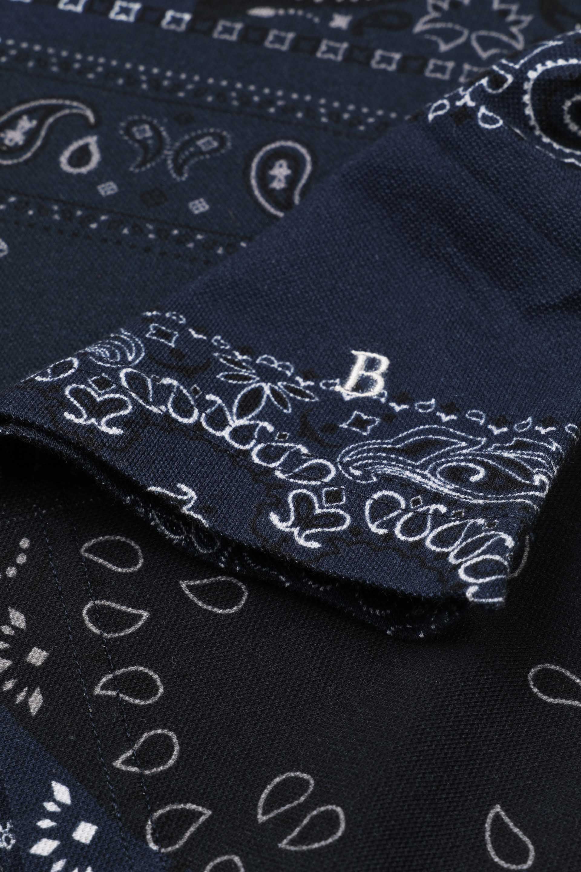 Polo collo aperto in piquet di cotone con stampa. - Blu