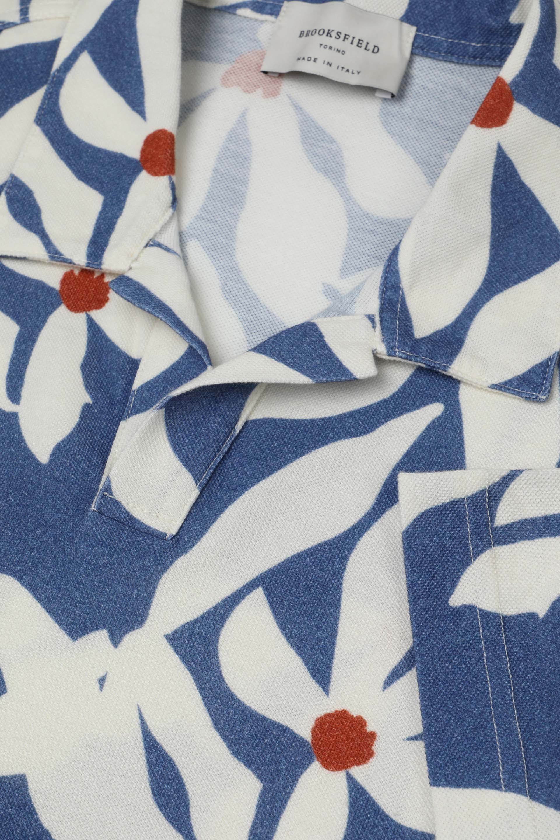 Polo collo aperto in piquet di cotone, stampa Magnolia. Blu - Sailor/Avorio