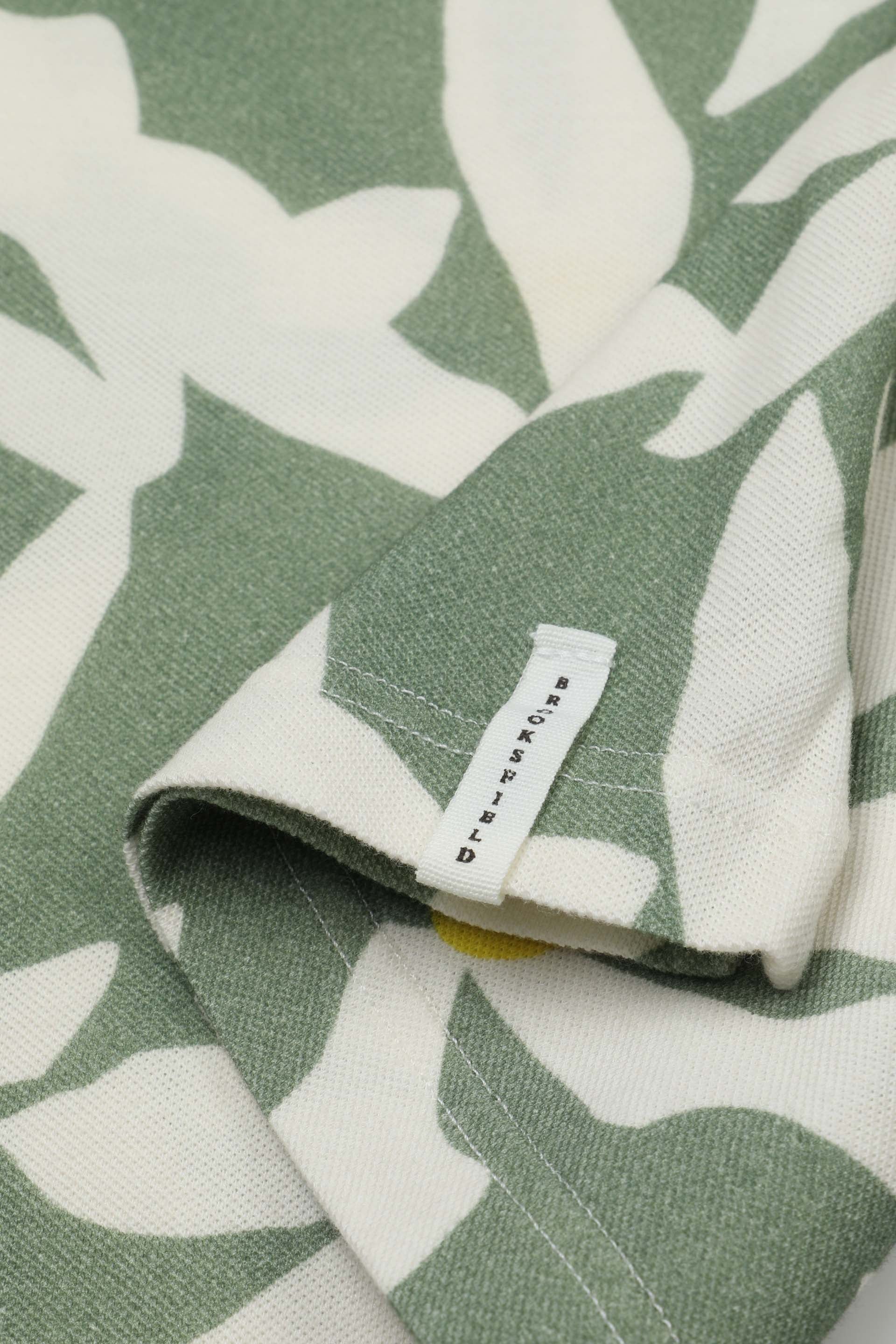 Polo collo aperto in piquet di cotone, stampa Magnolia. Verde - Aneto/Avorio