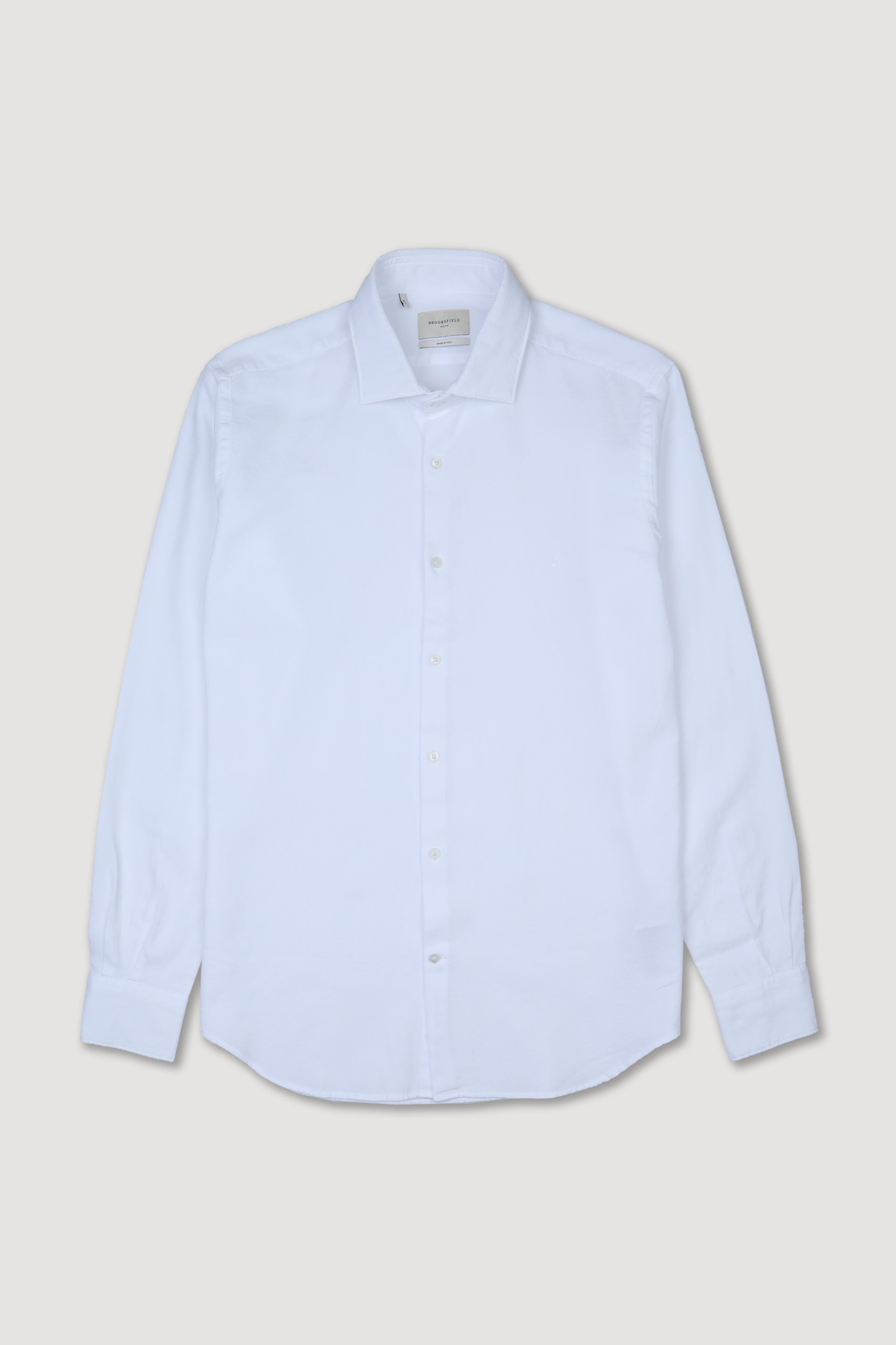 Camicia slim fit con collo spread in cotone operato. Logo ricamato al cuore - Bianco
