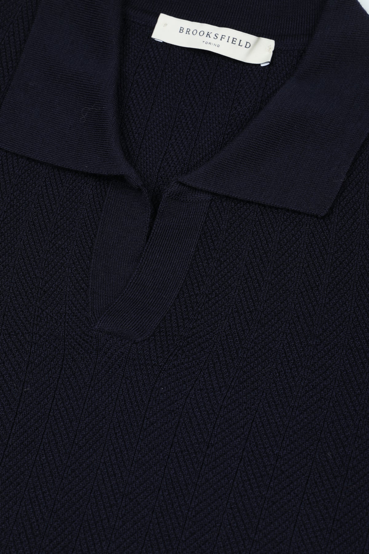 Polo in maglia in lana merino extrafine con punto obliquo. Blu - Navy