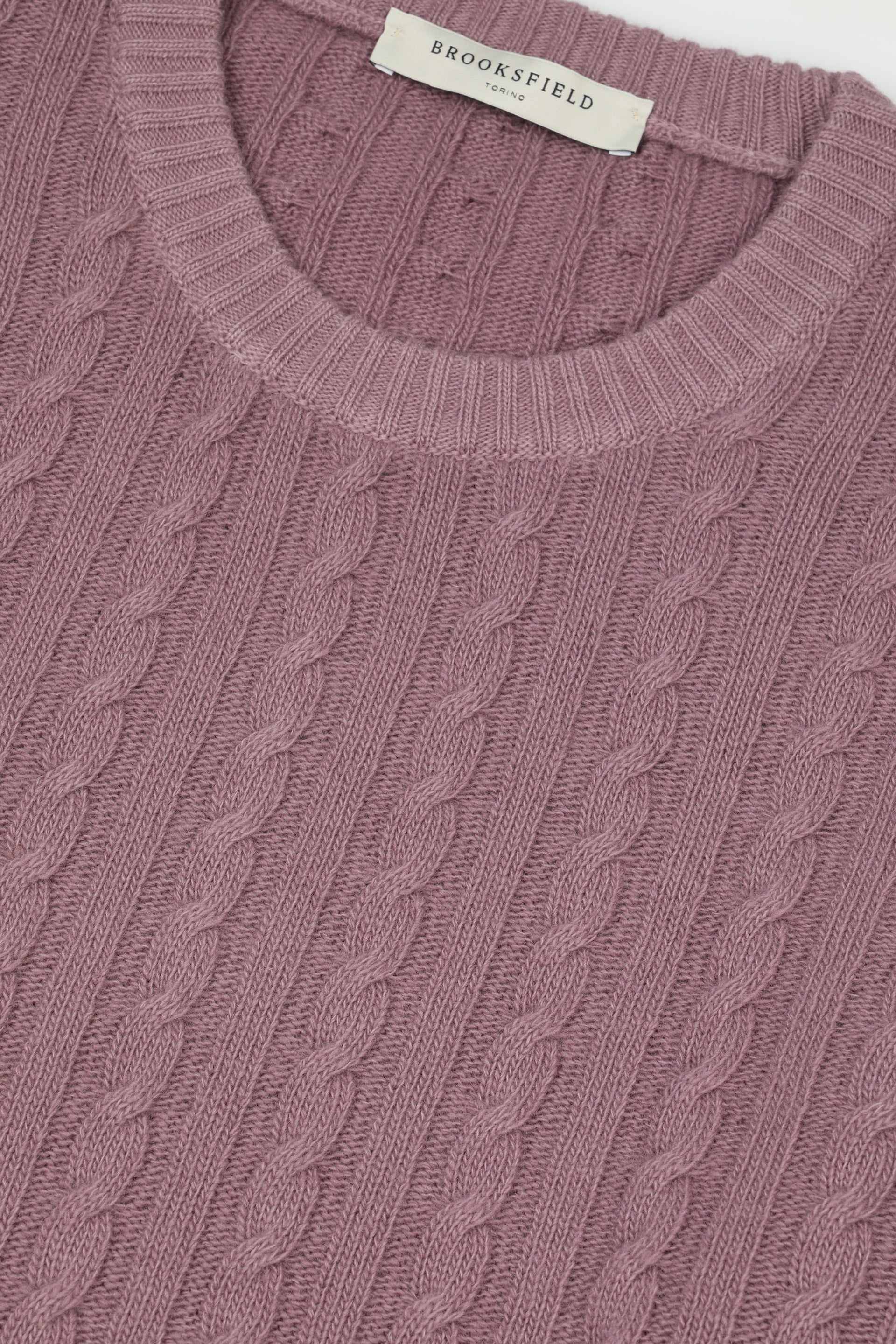 Maglia girocollo a trecce in lana. Rosa - Malva