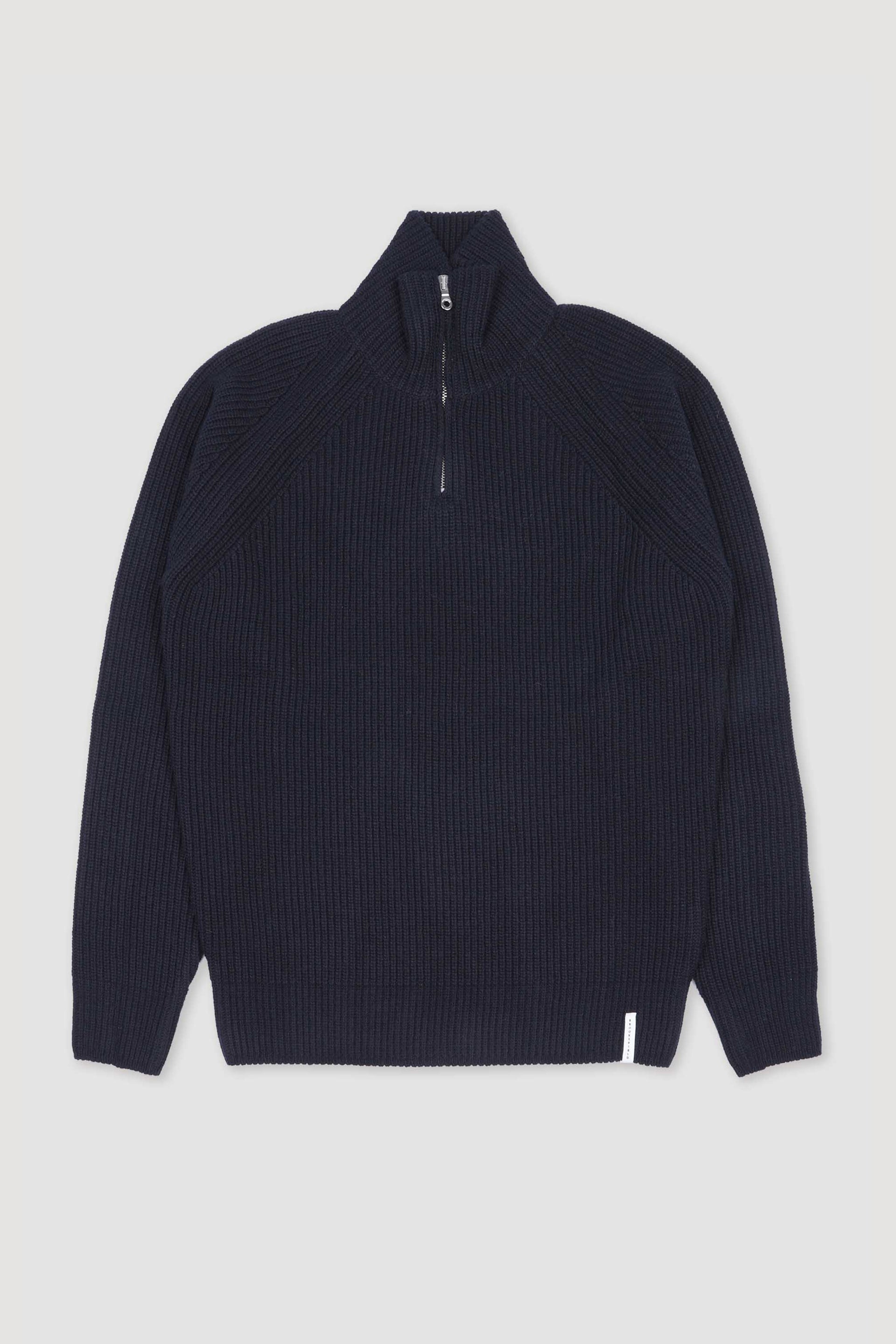 Maglia collo alto mezza zip realizzata in maglia inglese in misto lana-cashmere. Blu - Navy