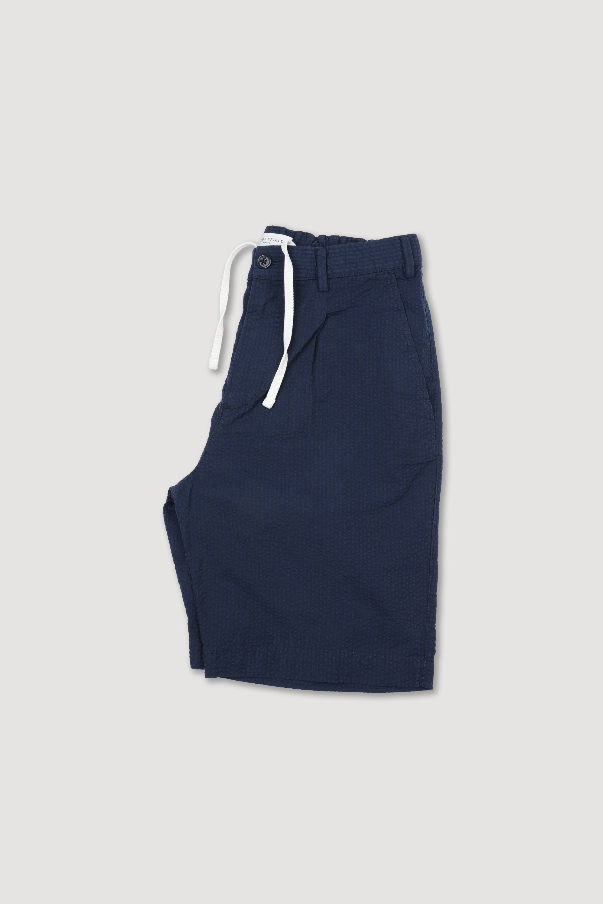 Bermuda jogger in cotone seersucker rigato con pinces, coulisse e cintura elastica in vita. Blu - Dark blue/Navy