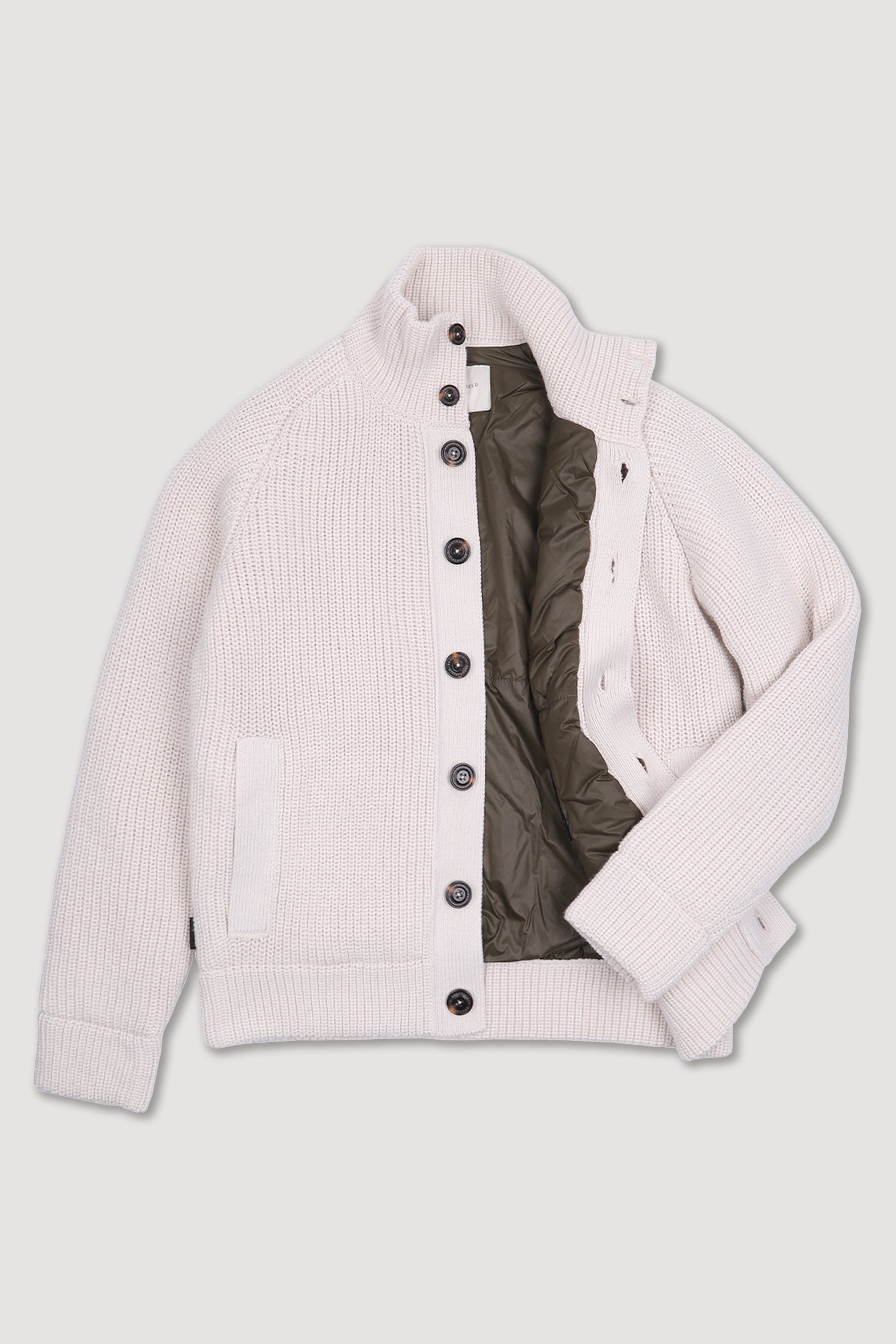 Giubbotto in maglia inglese imbottito realizzato in misto lana. Bianco - Avorio