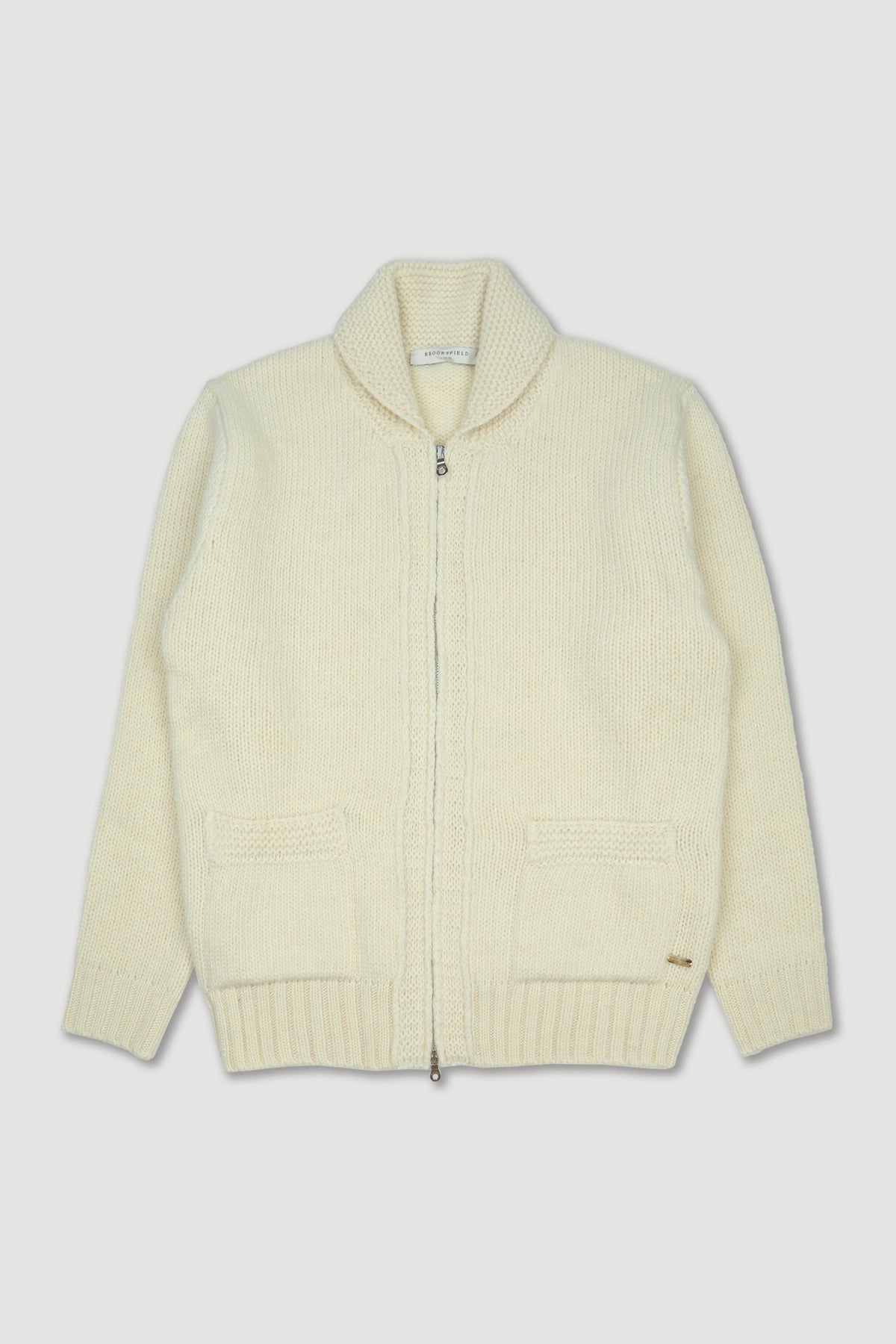 Giubbotto in maglia con zip realizzato in pura lana vergine. Panna - Avorio