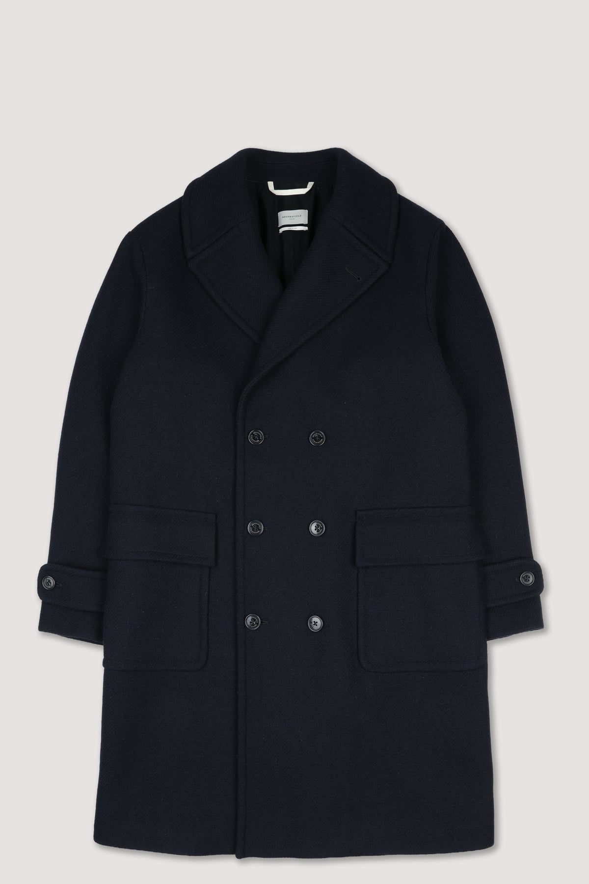 Cappotto doppiopetto realizzato in misto lana, foderato. Blu - Navy